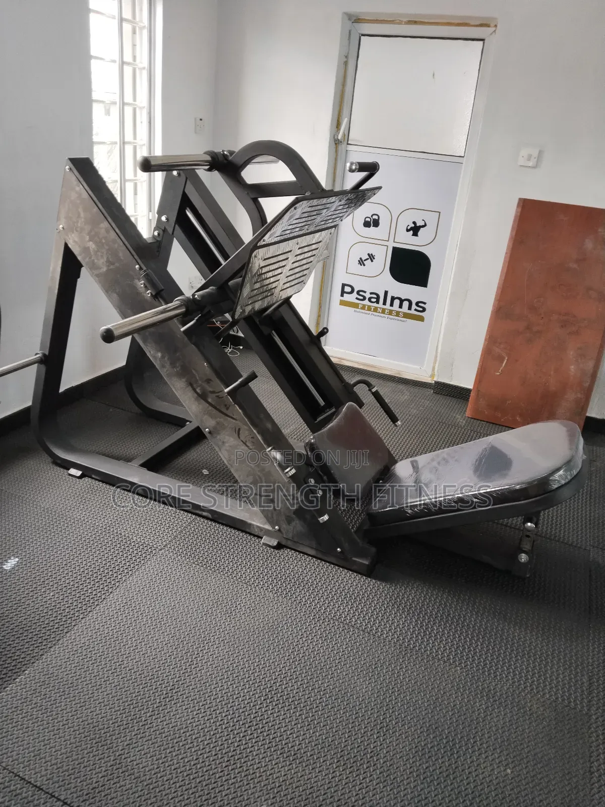 Commercial Leg Press Machine With Weight Storage Racks.