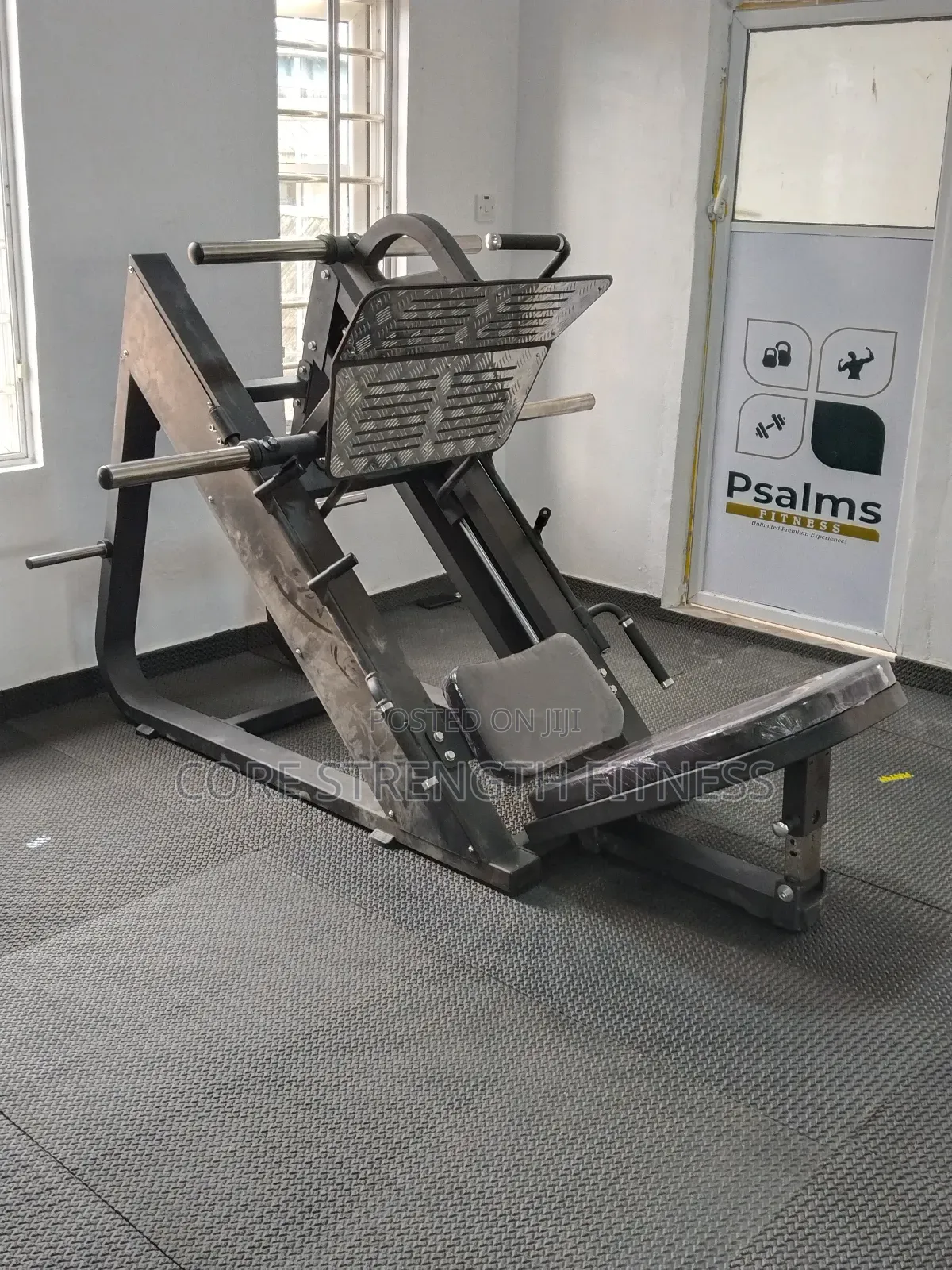 Commercial Leg Press Machine With Weight Storage Racks.