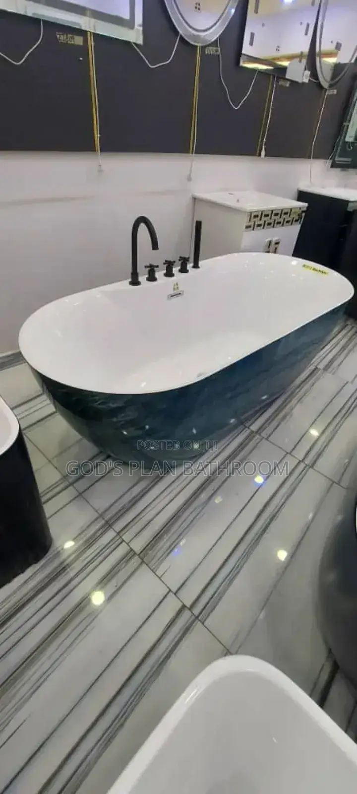Executive Bathtub With Black Mixer