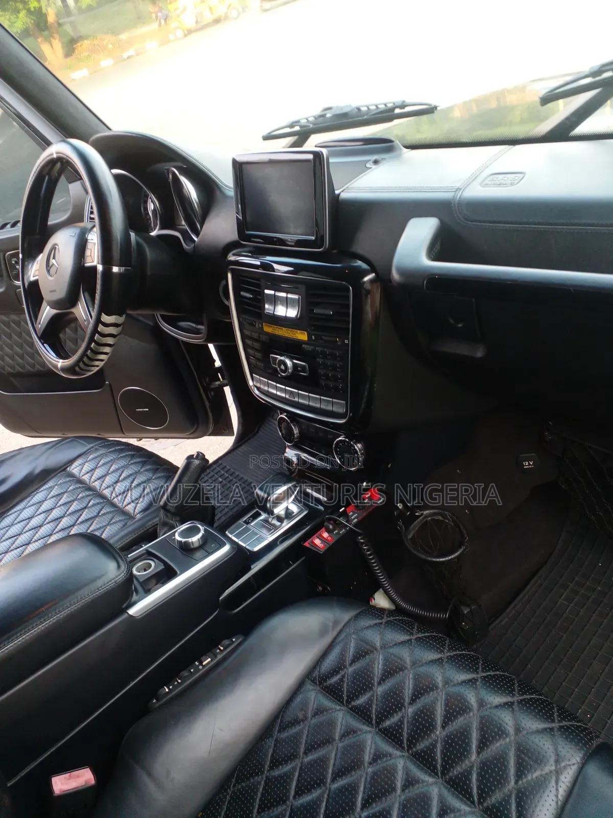 Mercedes-Benz G-Class G63 AMG 4dr SUV 4WD (5.5L 8cyl Turbo 7A) 2014
