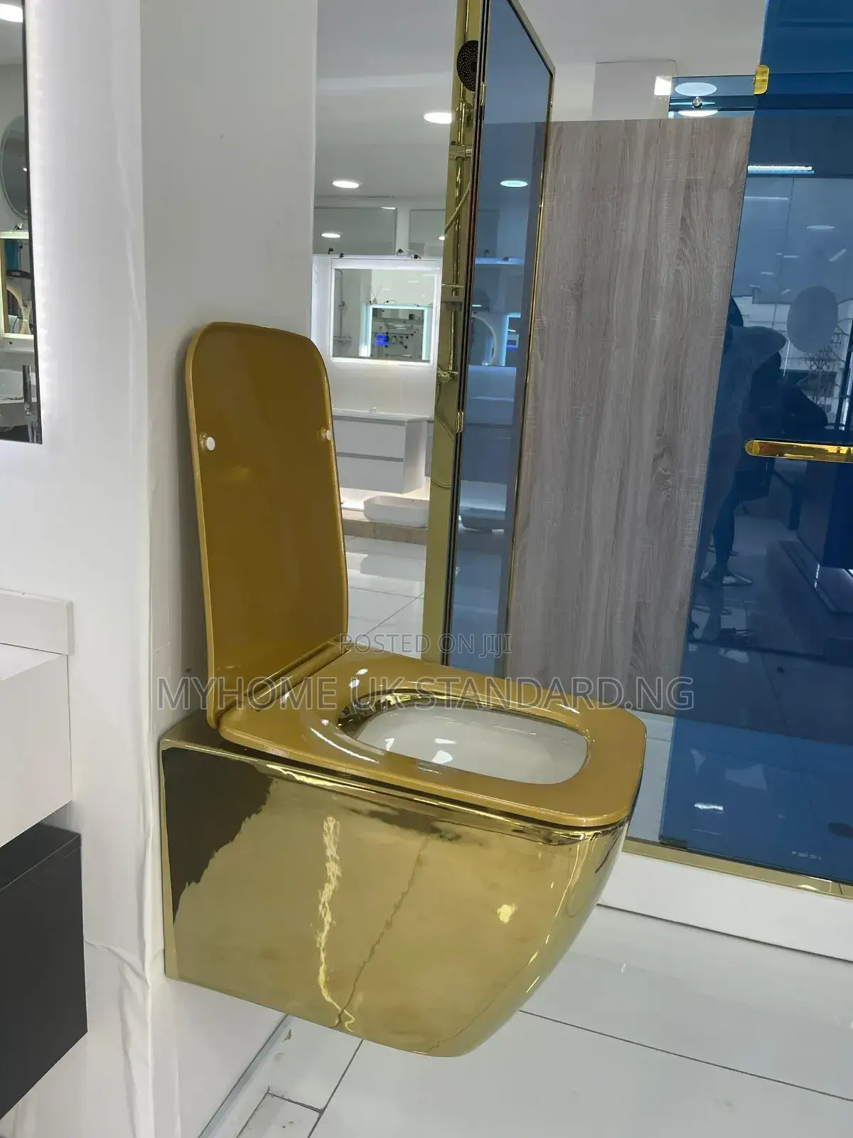 Gold And White Wall Hung Water Closet With Tank