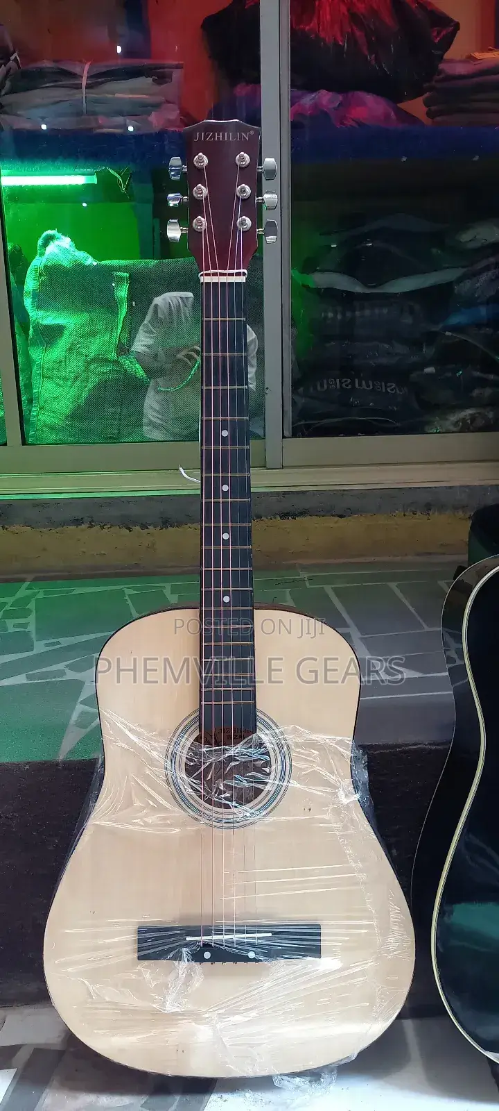 Jizhilin Children Seize Acoustic Guitar