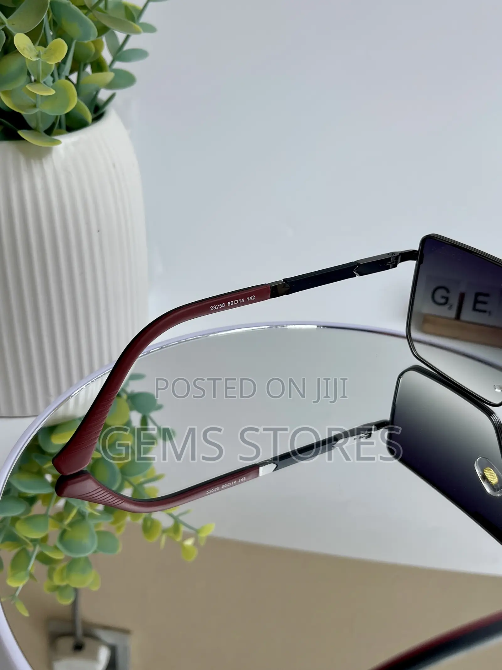 Stylish Prada Aviator-Style Sunglasses - Black Red Tones