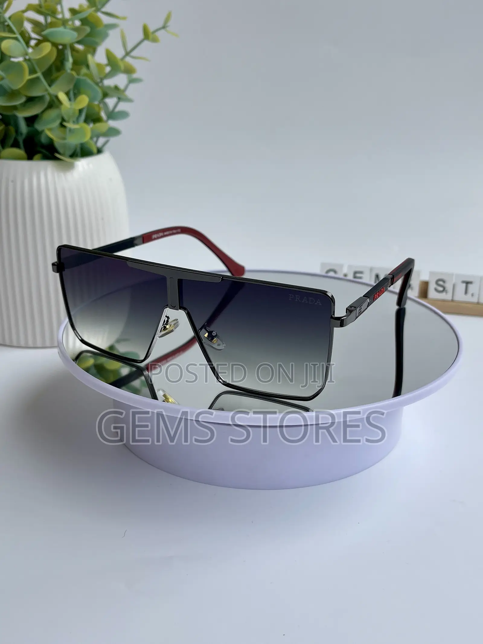 Stylish Prada Aviator-Style Sunglasses - Black Red Tones