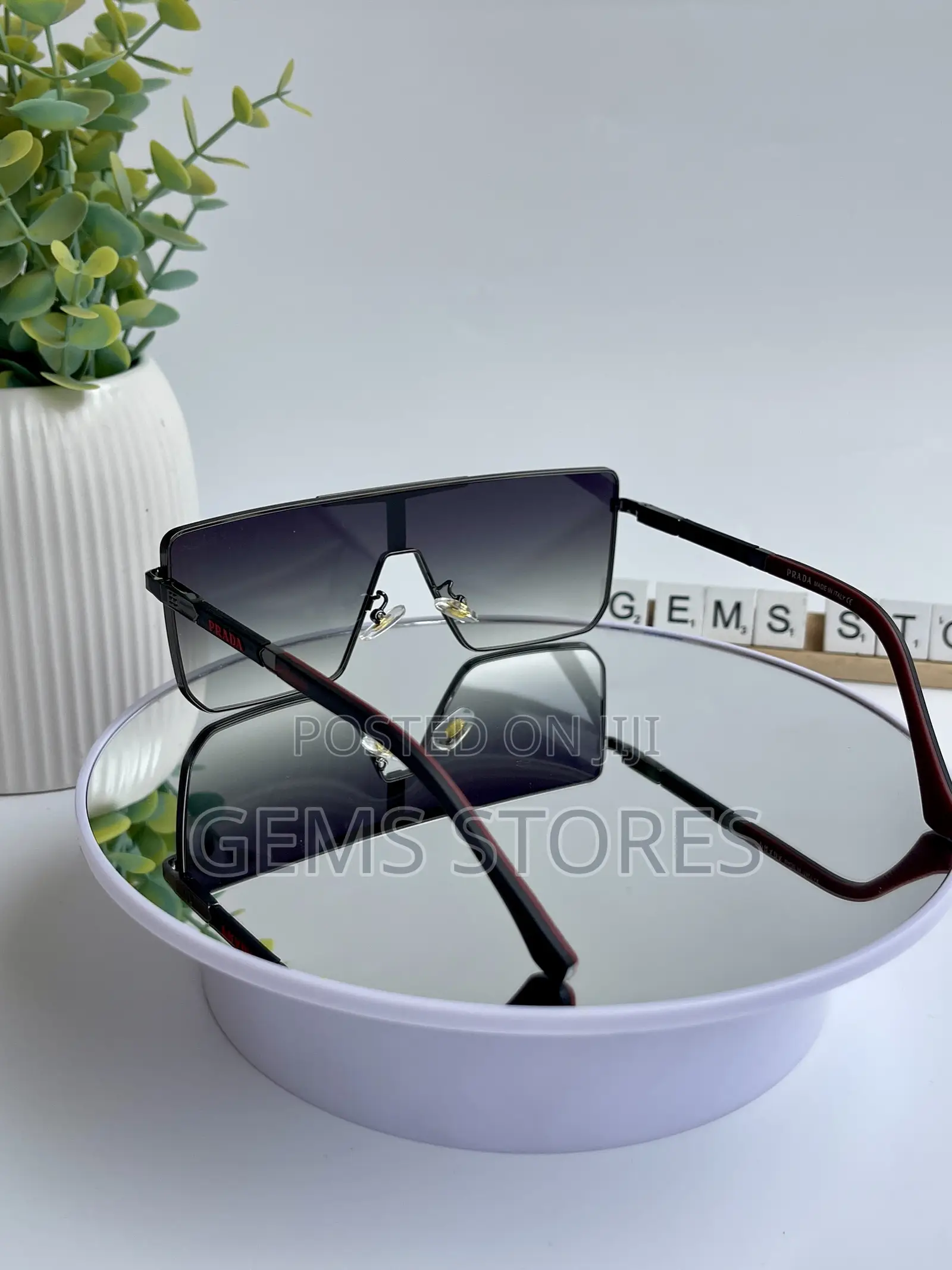 Stylish Prada Aviator-Style Sunglasses - Black Red Tones
