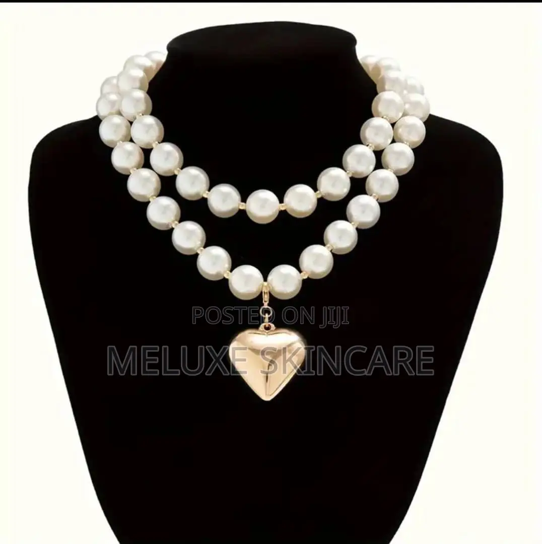 A Luxurious, Elegant and Sweet Imitation Pearl Beaded Love Pendant
