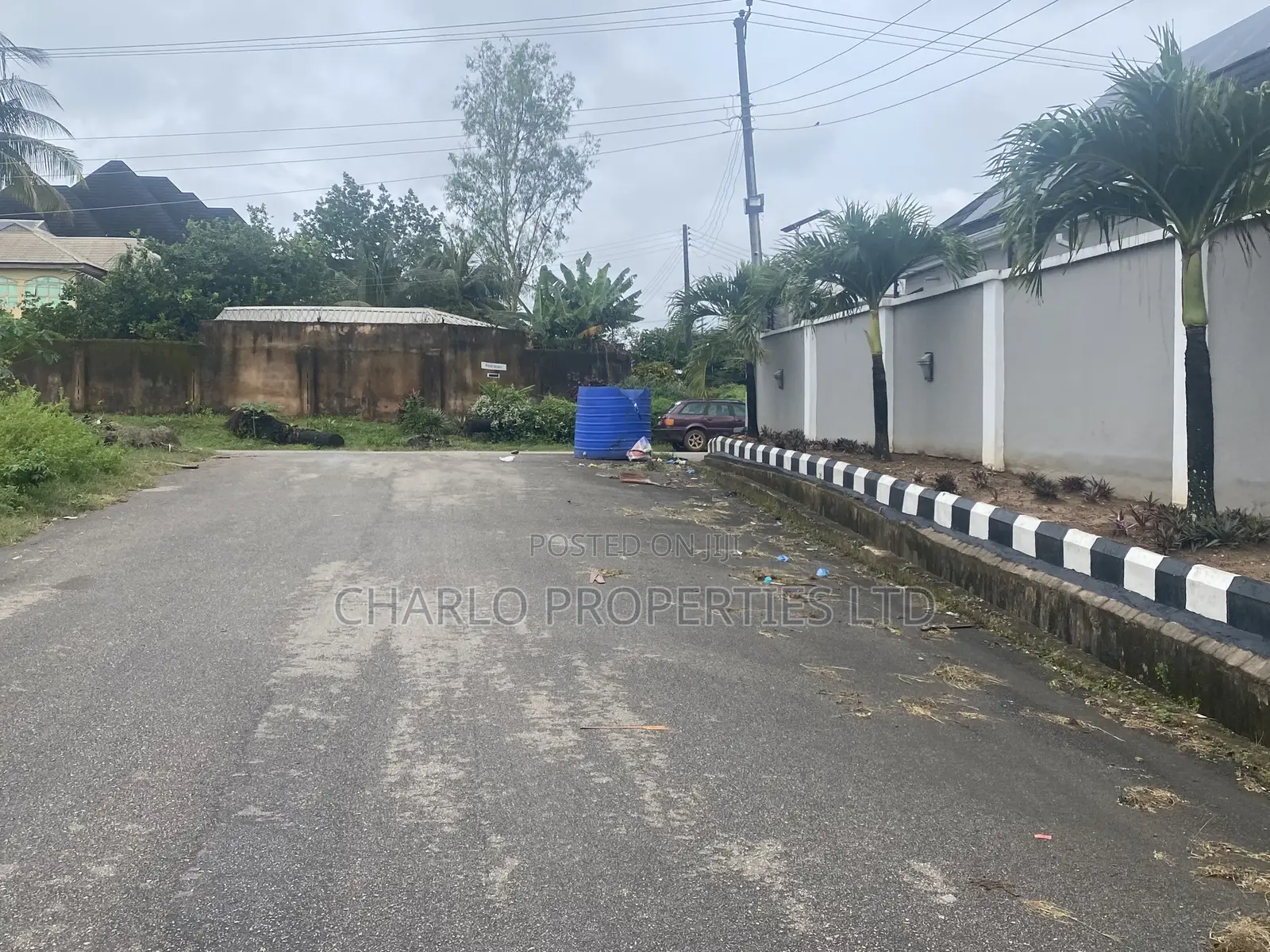 Genuine 100ft by 100ft With C of O in Etete Layout for Sale