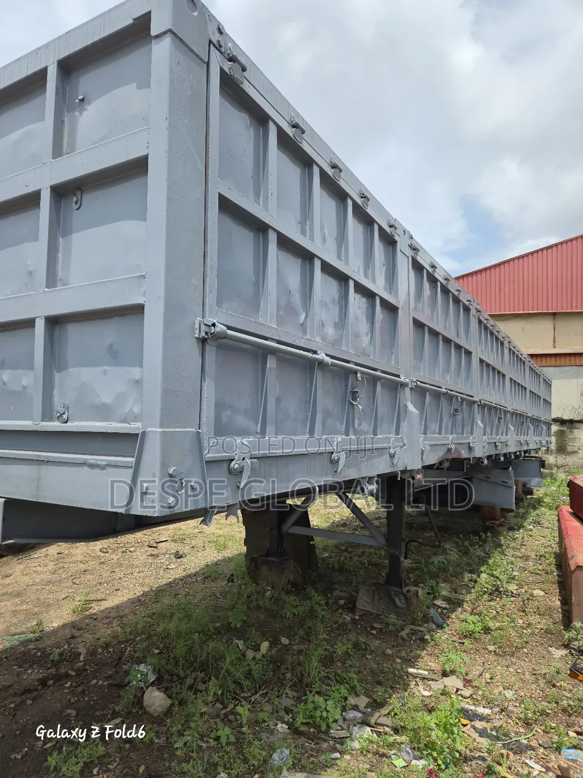 A 3 Axle Refurbished Big Sided Body Trailer That Can Tip Sideways