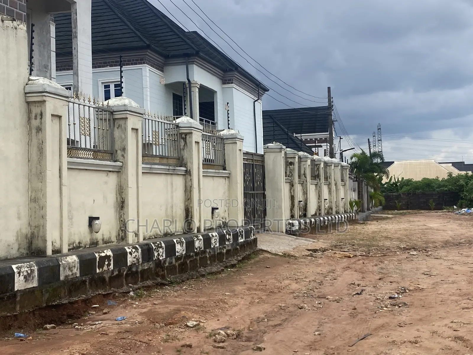 Genuine Multipurpose 100ft by 100ft With C of O for Outright Sale