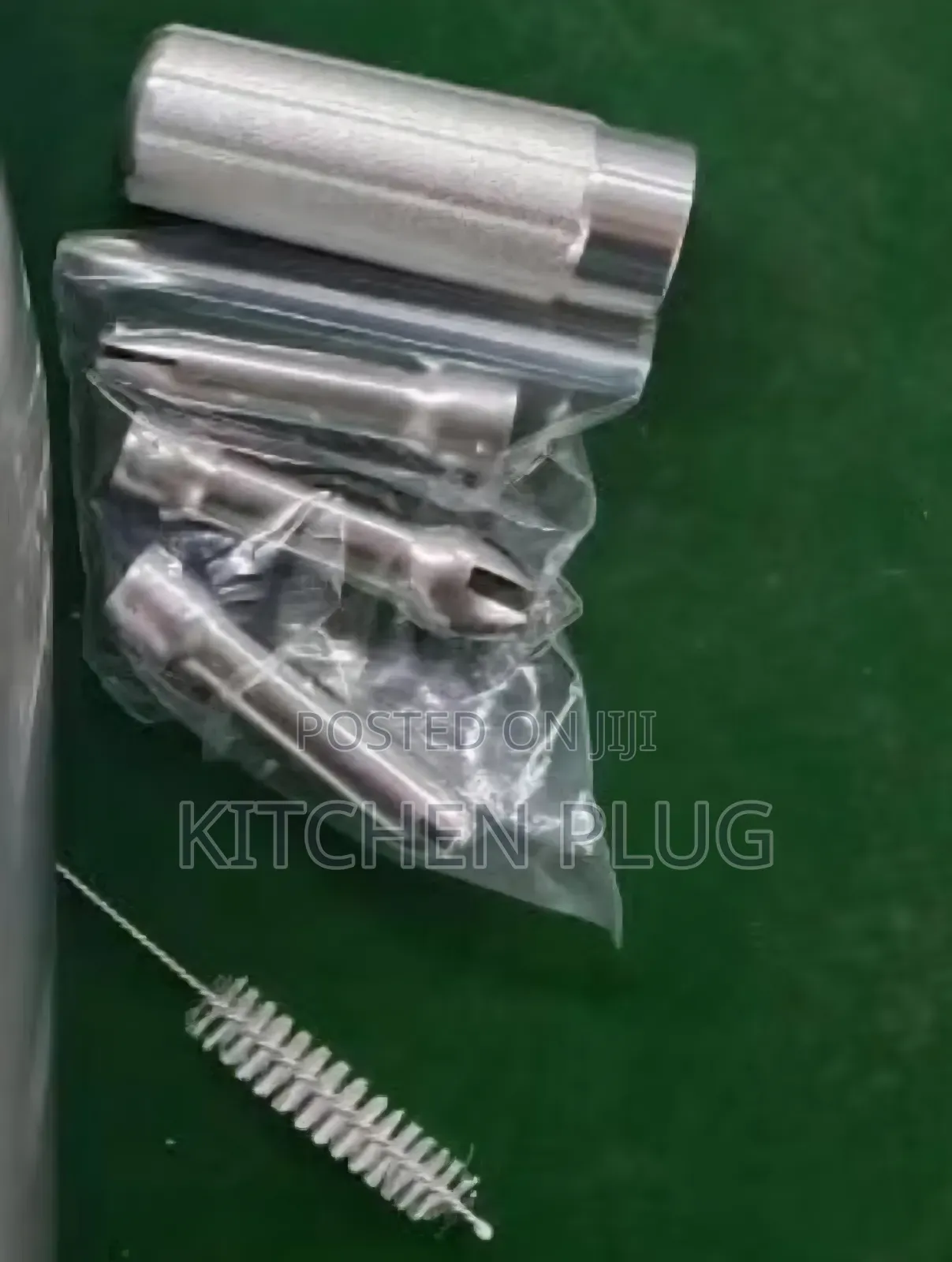 Cream Whipper Accessories/ Injector Tips, a Cleaning Brush.