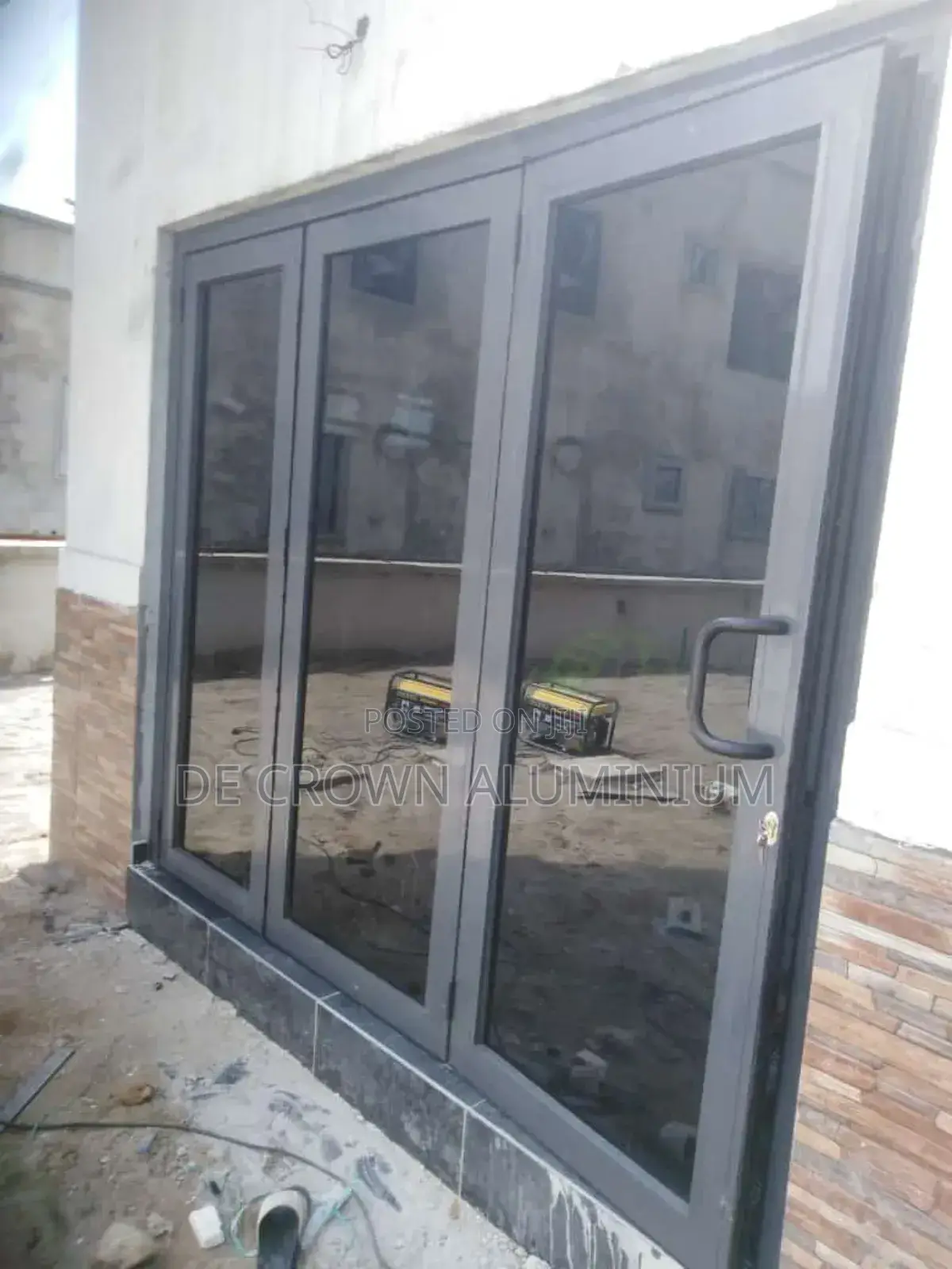Luxury Aluminium Collapsible Door With Grey Glass Durable Space Saver.