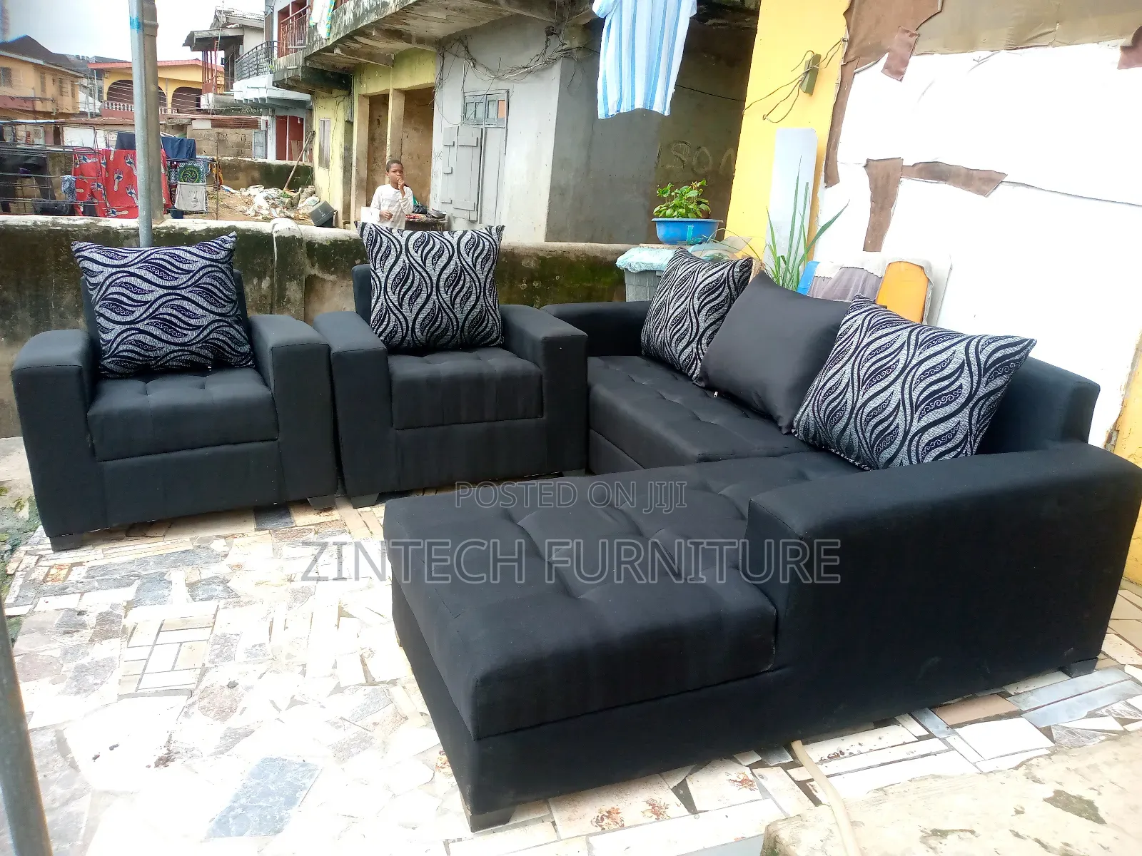 Black Color L Shape Sofas and Two Single Seater