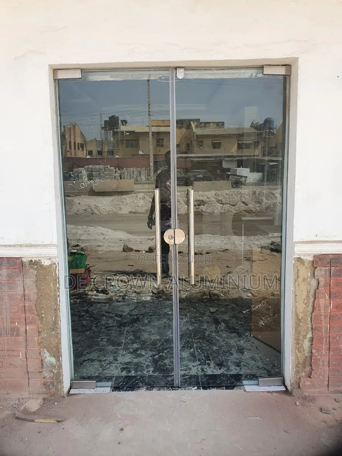 Frameless 10mm Tempered Glass Shop Entrance Door In Lagos