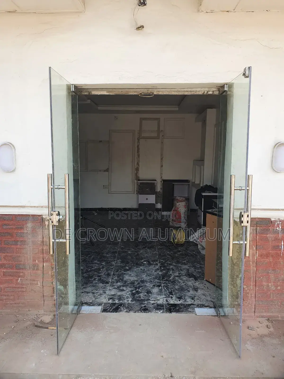 Frameless 10mm Tempered Glass Shop Entrance Door In Lagos