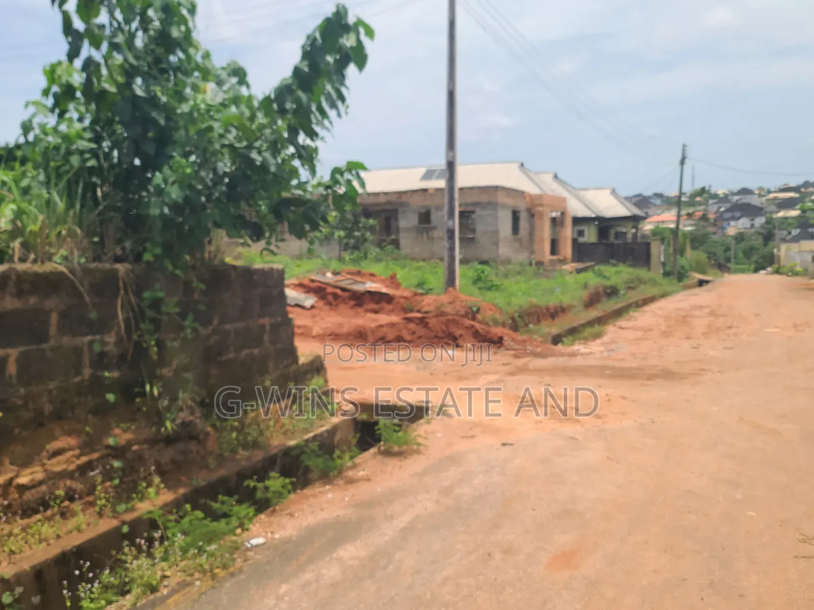 For Sale:Swt 100x100ft With Structure at Evbodia Airport Road Extension