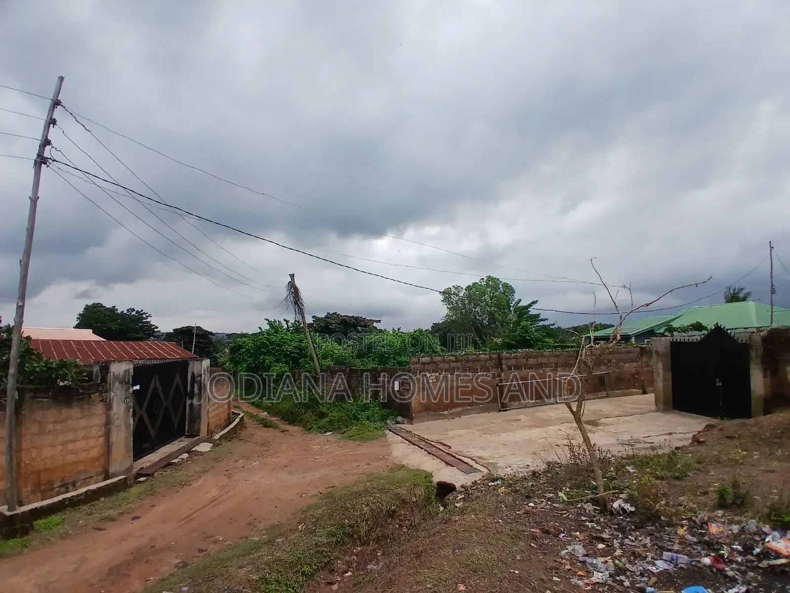 14,233.385sqm Fenced Land With Structures for Sale at Awoton