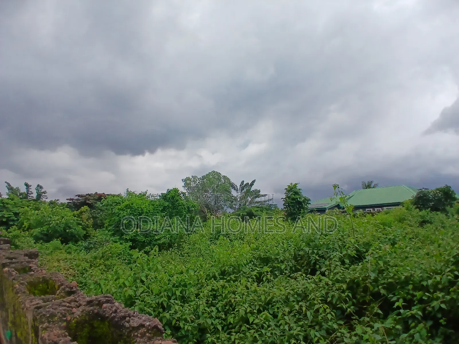 14,233.385sqm Fenced Land With Structures for Sale at Awoton