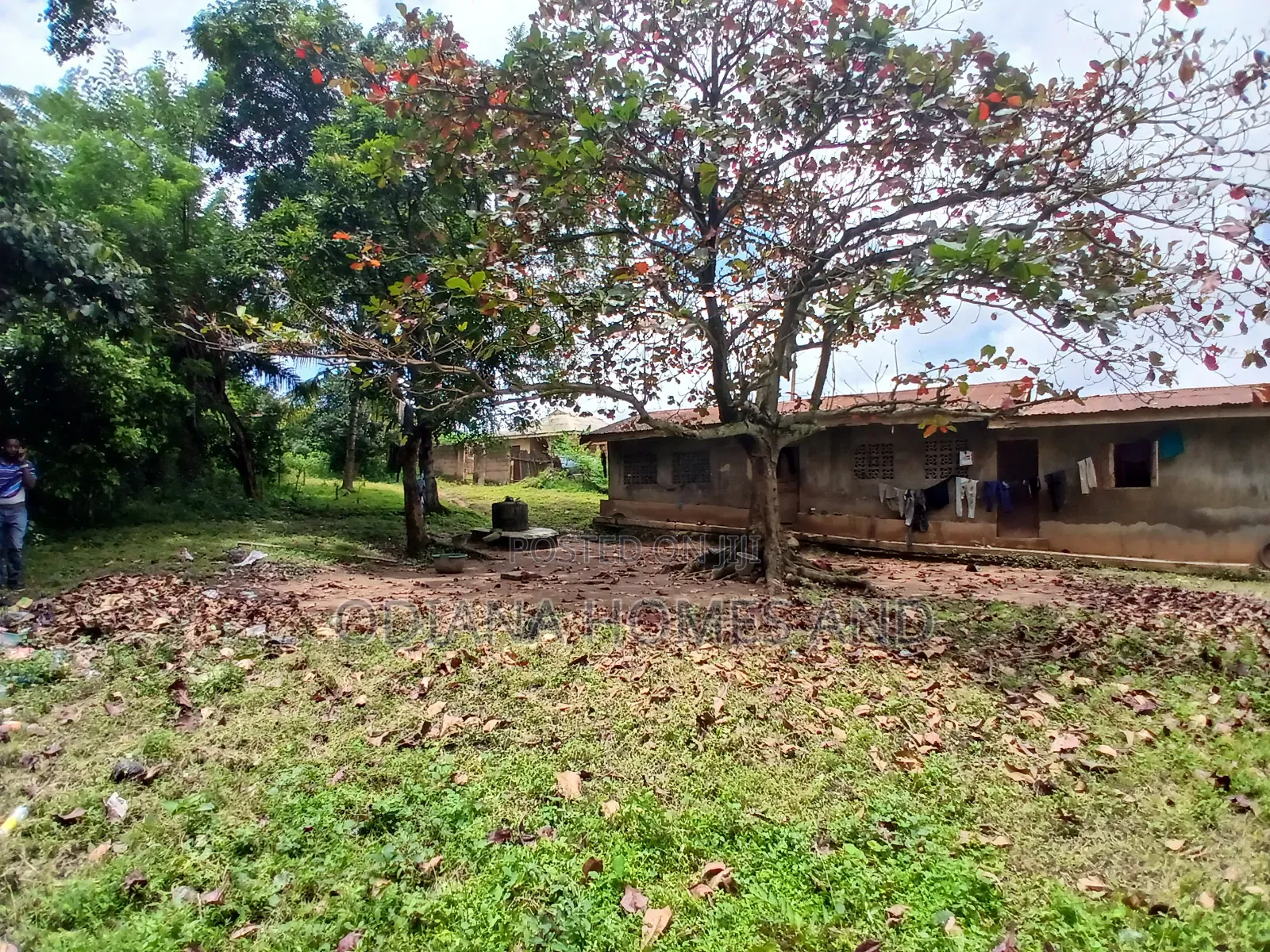 14,233.385sqm Fenced Land With Structures for Sale at Awoton