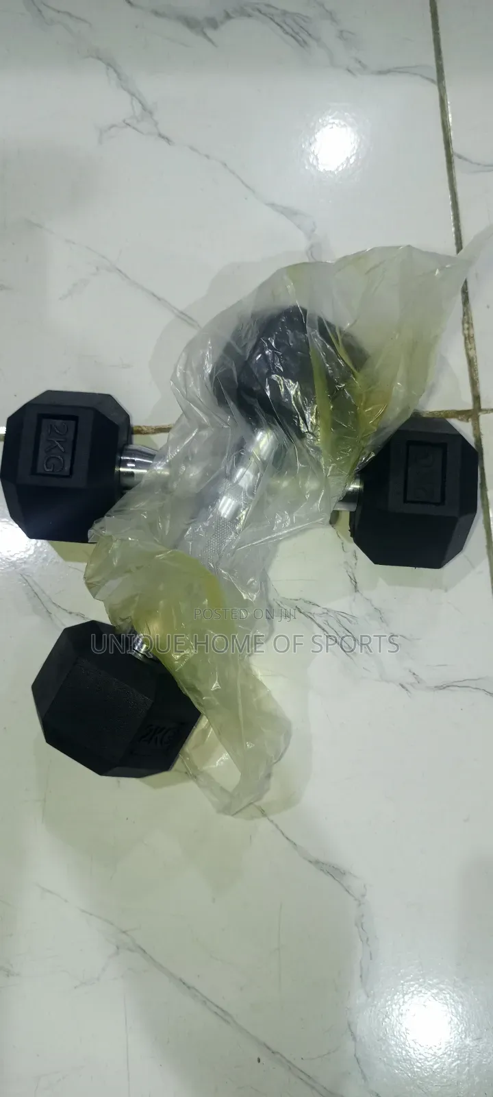 A Pair Of 2kg Hex Dumbbell