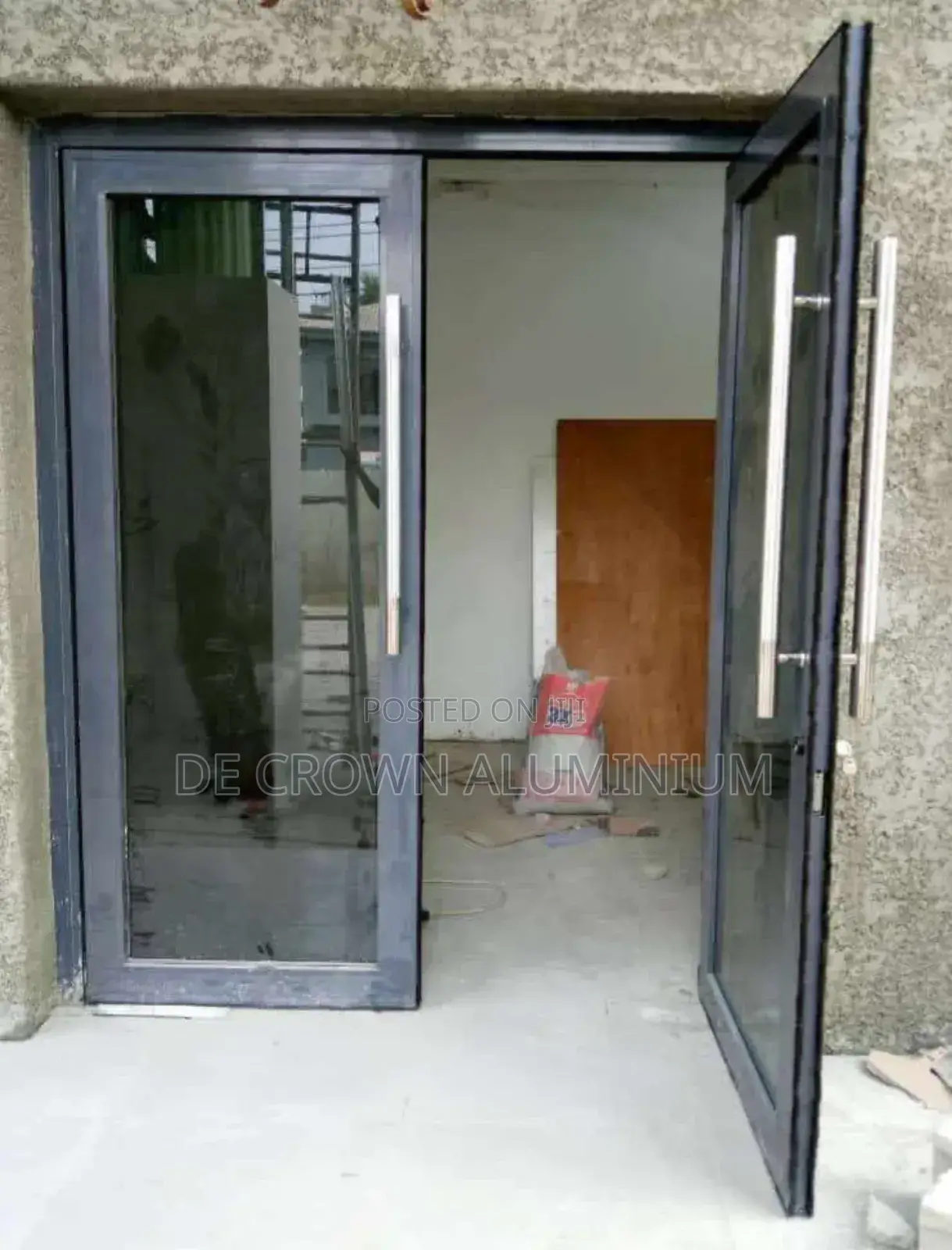 Luxury Aluminium Glass Swing Door – Lagos Installation