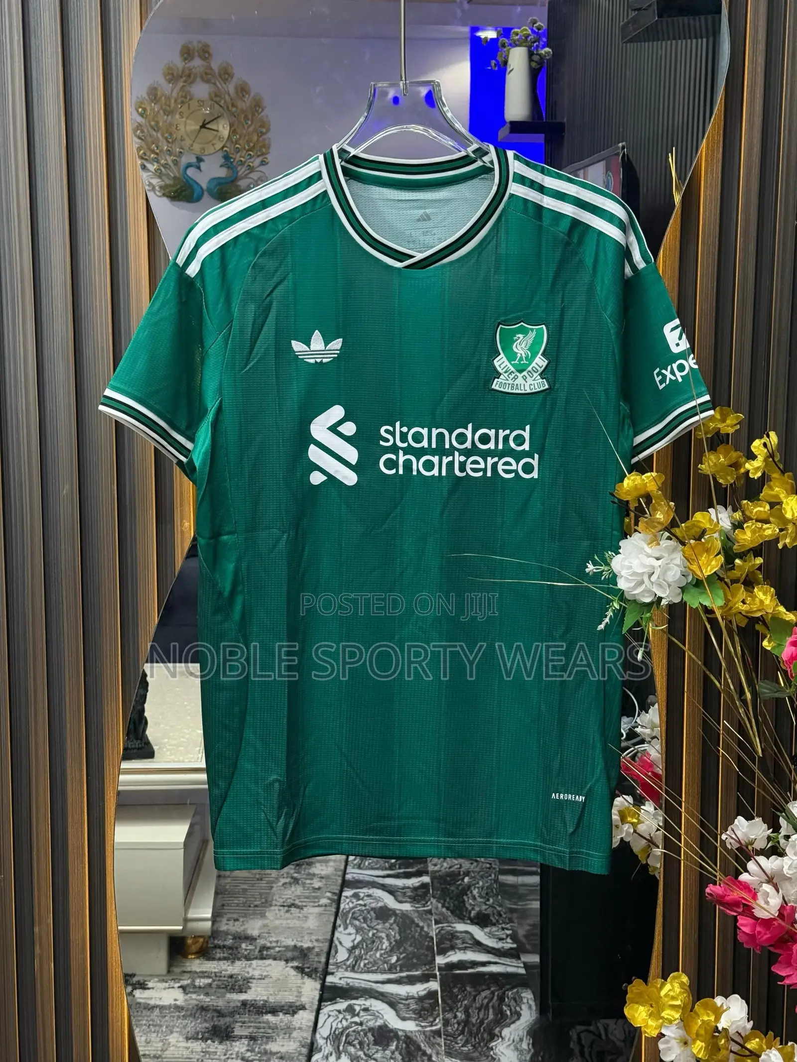 Liverpool Kits in Red, White, Green and Black Color. Glamorous!