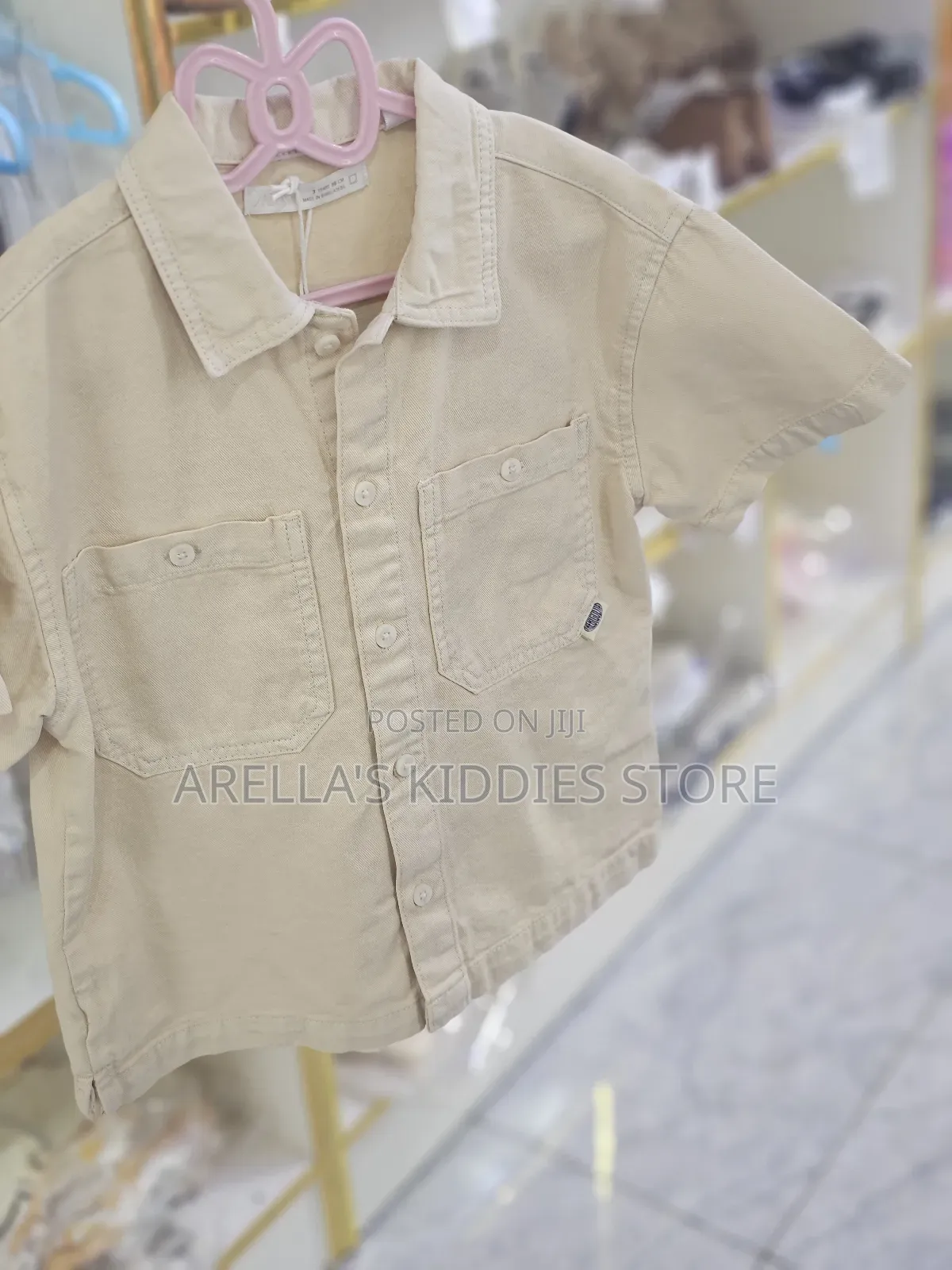 Short-Sleeved, Button-Up Shirt in a Light, Neutral Color