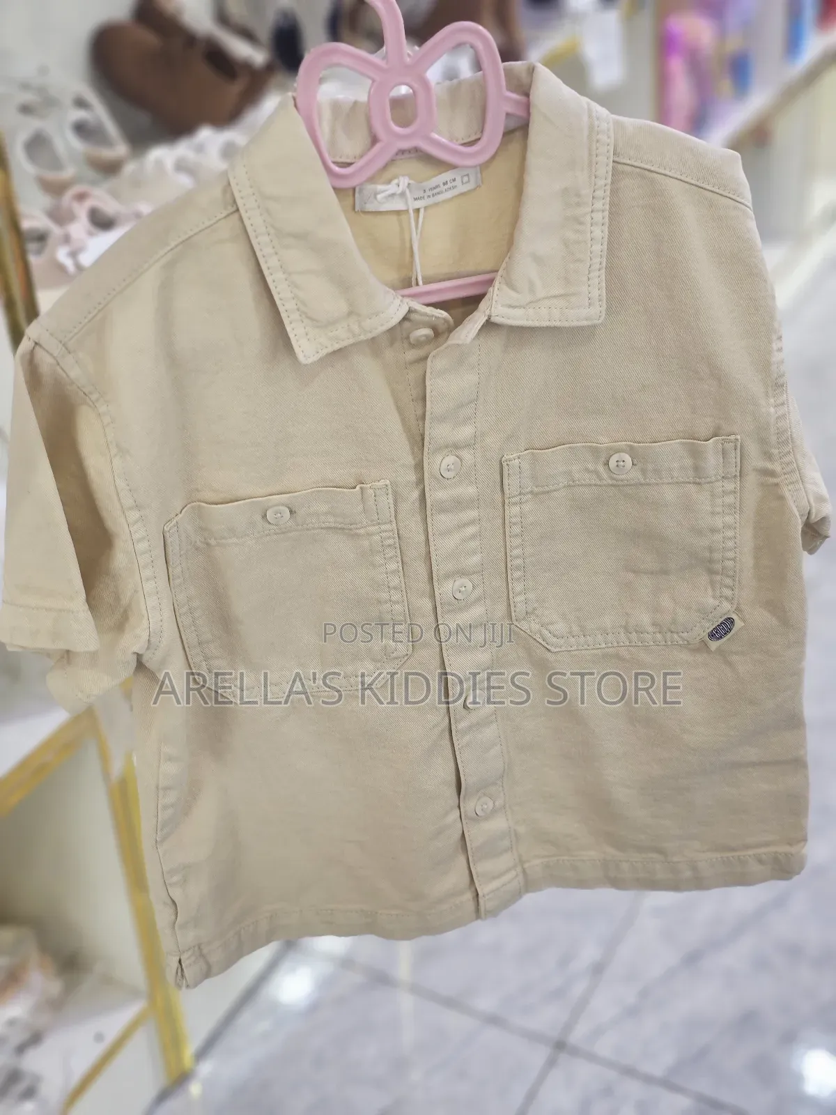Short-Sleeved, Button-Up Shirt in a Light, Neutral Color