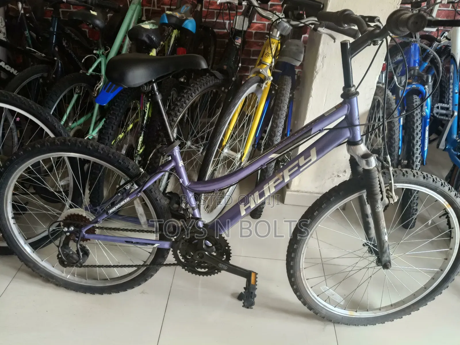 Size 24 Purple Huffy Adult Bicycle
