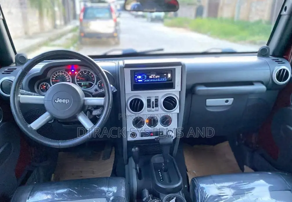 Jeep Wrangler Unlimited Sahara 2010 Burgundy