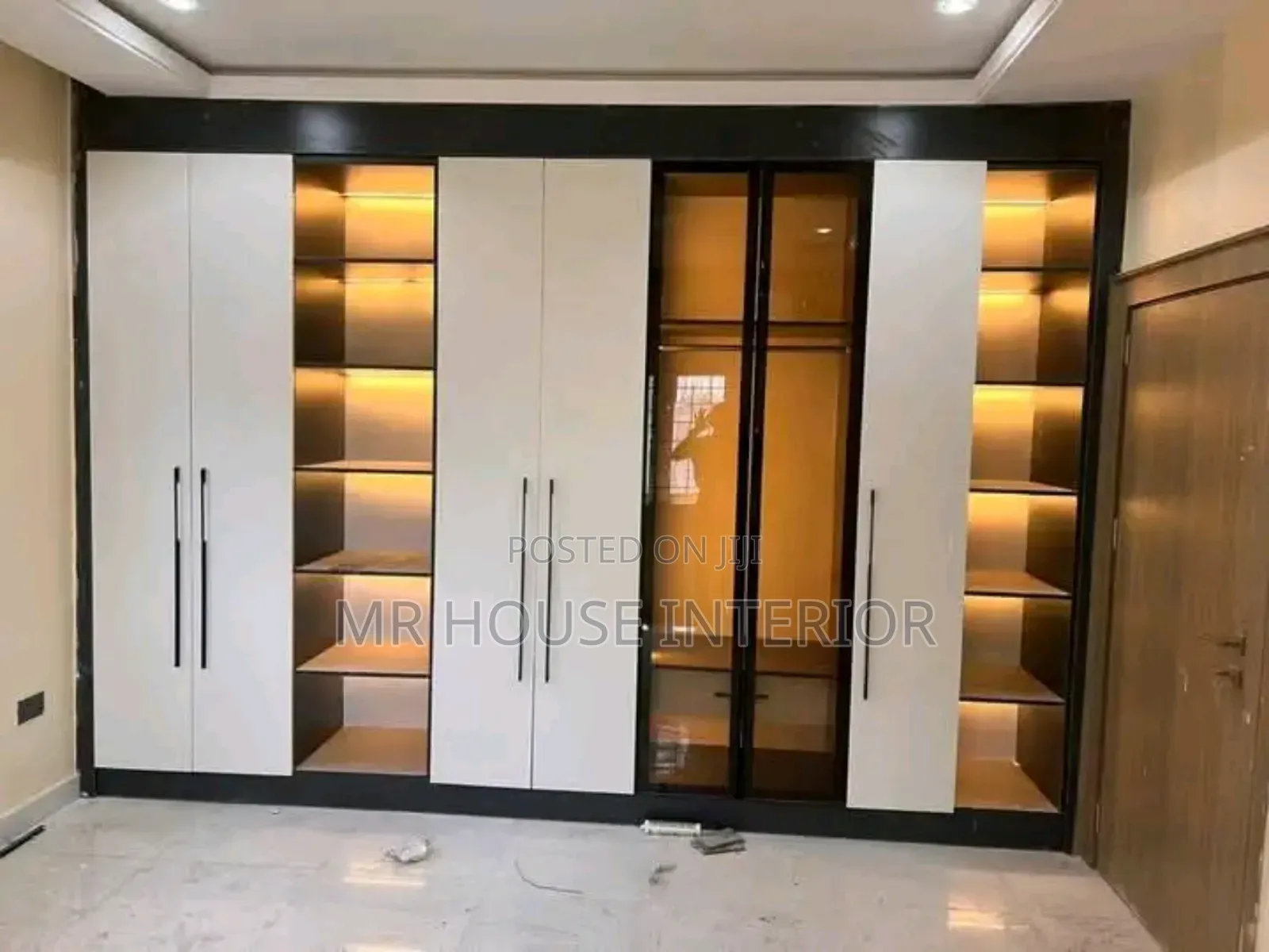 Wall to Wall Glass Wardrobe Stand Masters Room