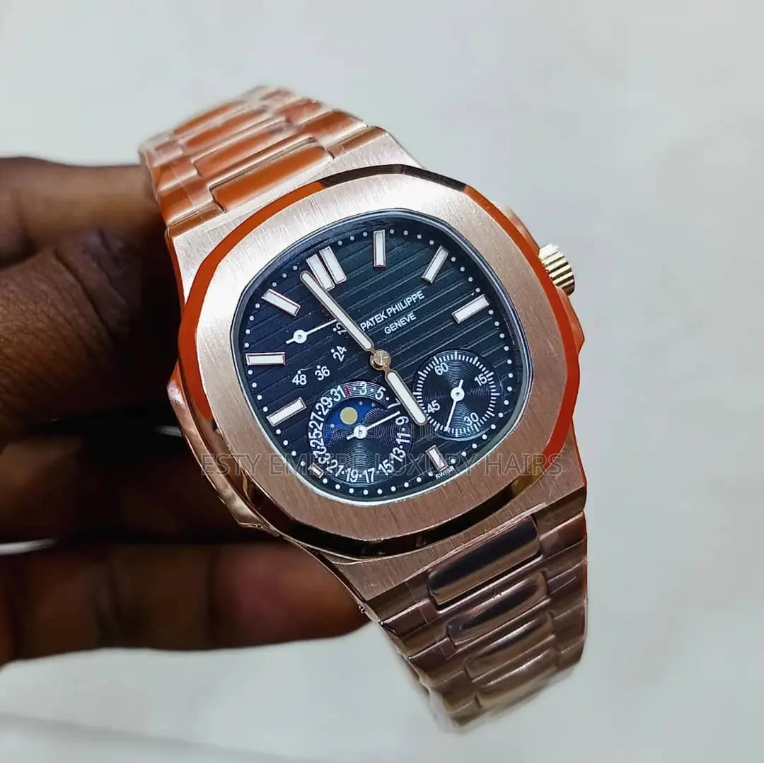 Patek P Nautilus 5712 Blue Dial Moon Phase Two Tone