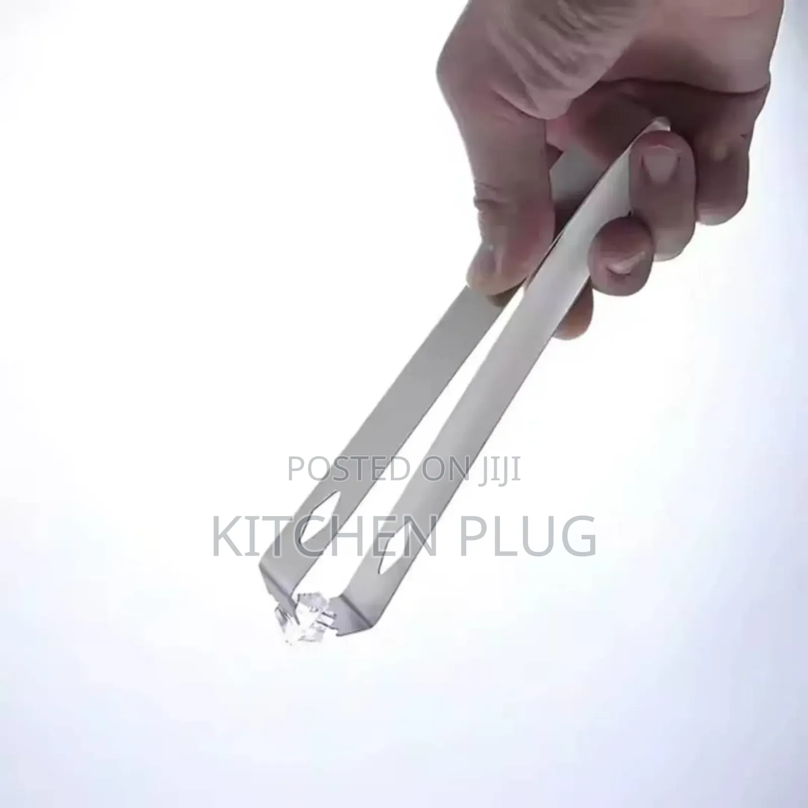 A Pair Of Stainless Steel Ice Tong