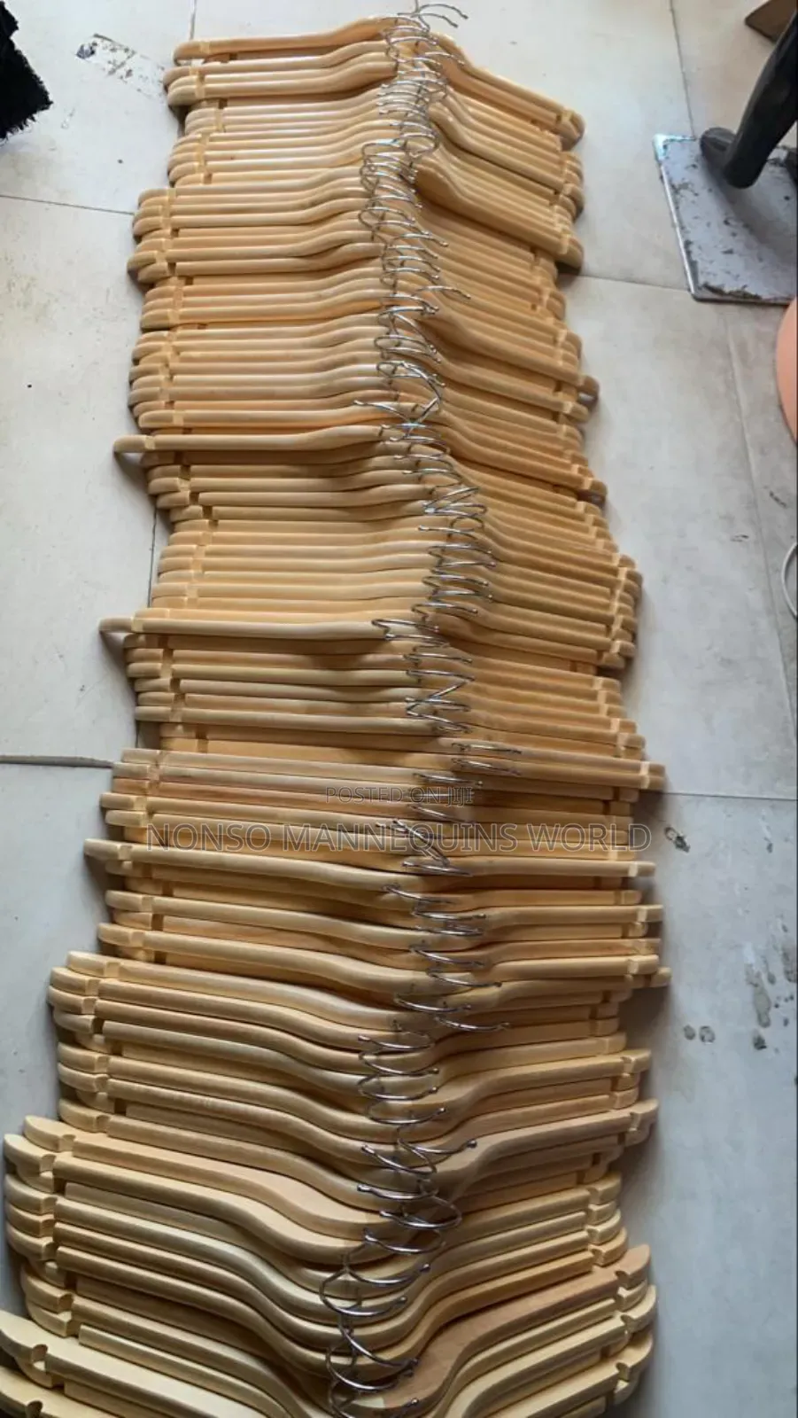 Packs Of Neat Sets Of Wooden Clothes Hangers