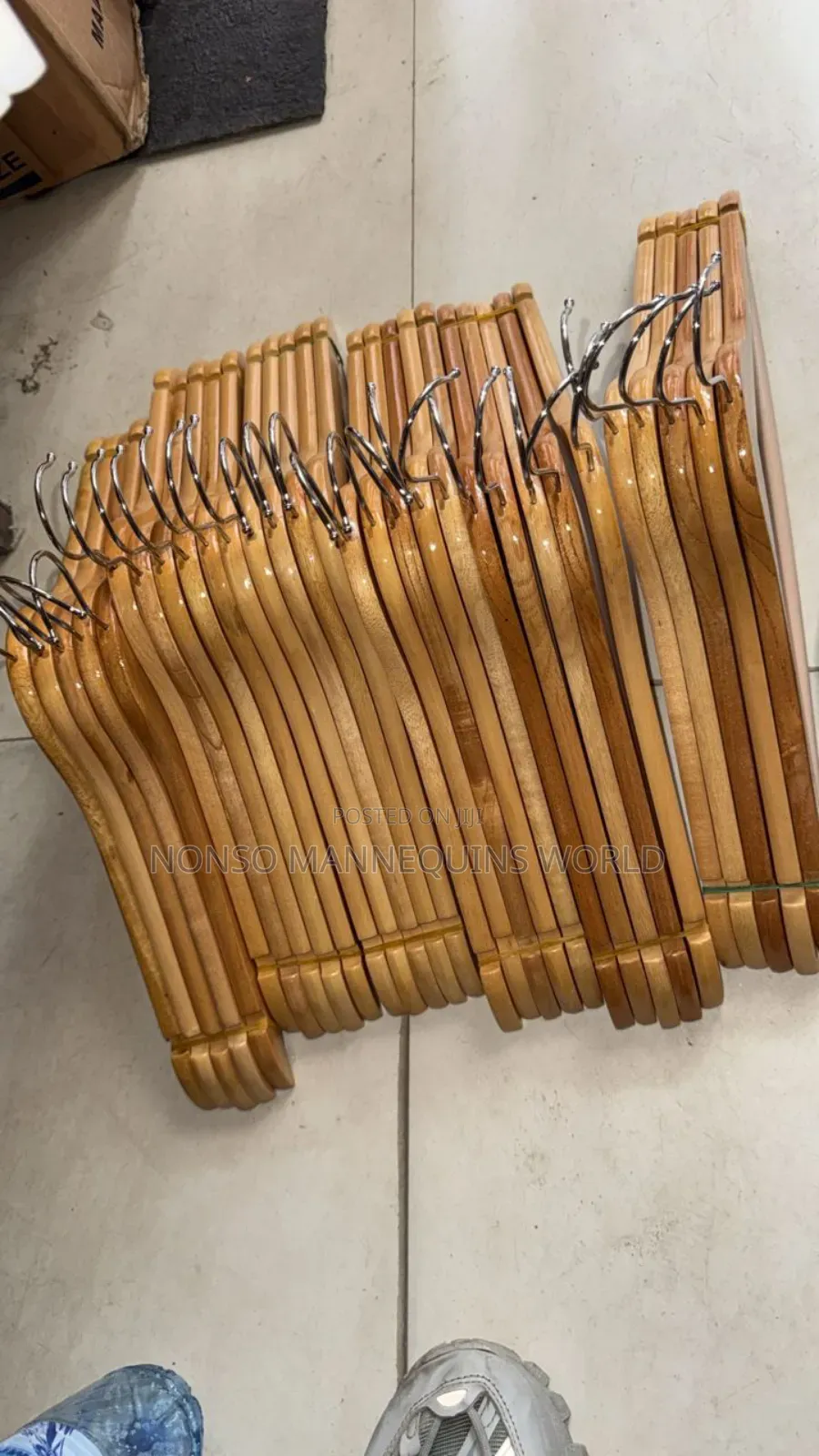 Packs Of Neat Sets Of Wooden Clothes Hangers