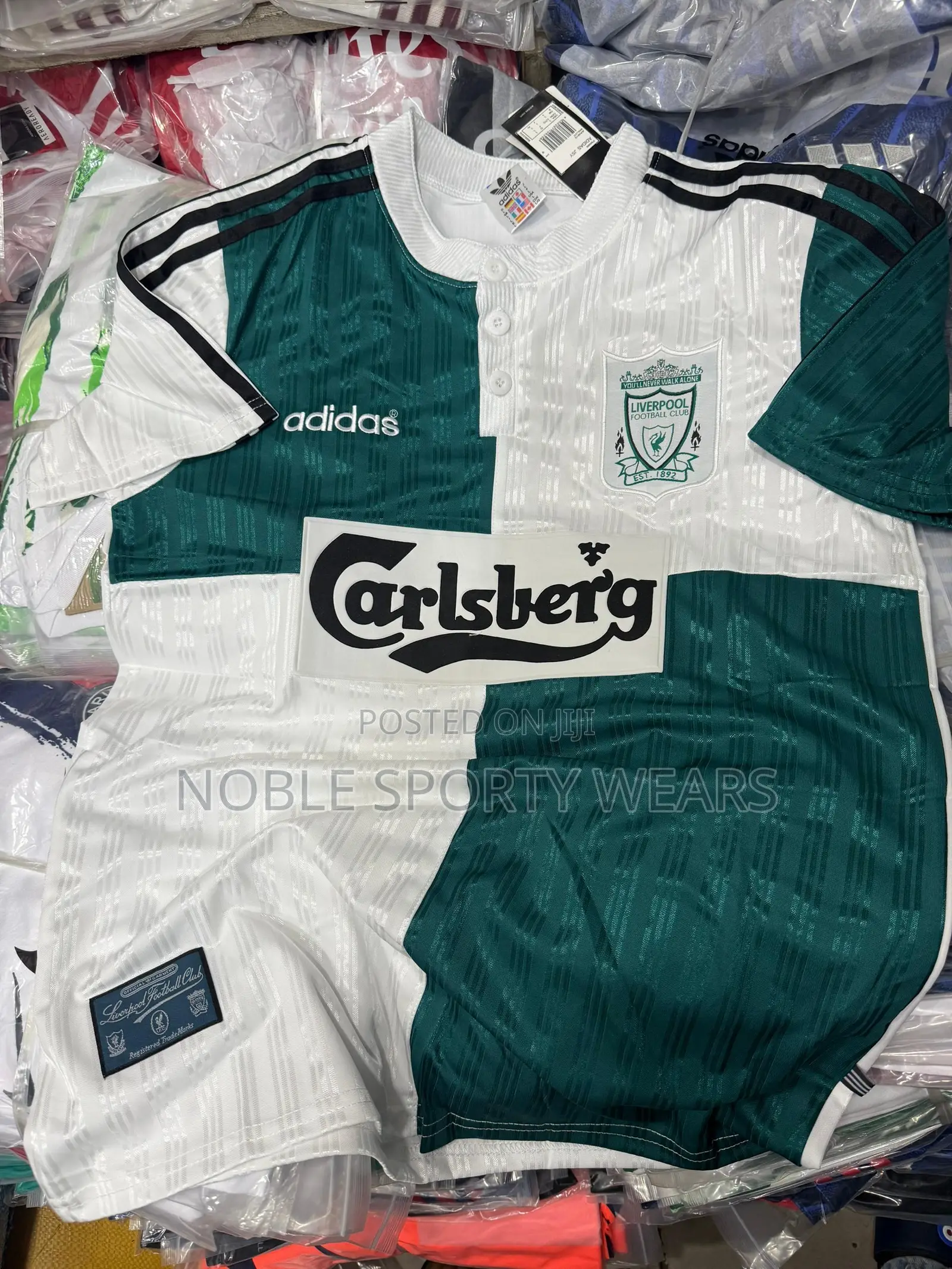 Legendary Liverpool Retro Jersey: Vibrant, Iconic 90s Style.