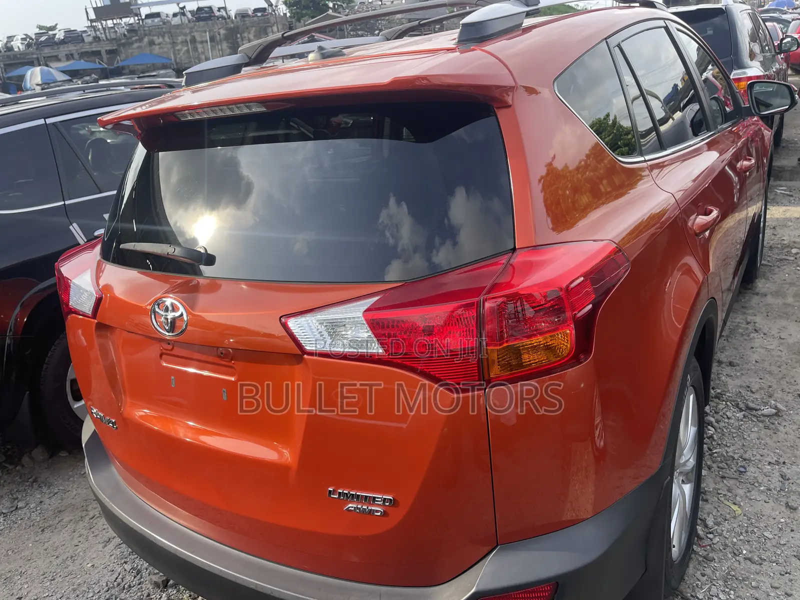 Toyota RAV4 Limited 4dr SUV AWD (2.5L 4cyl 6A) 2015 Orange