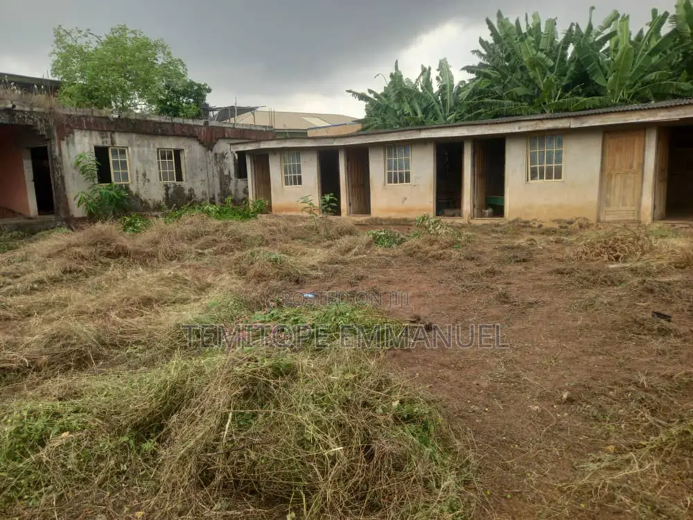 Complete 2 Plots of Land in a Vibrant Estate