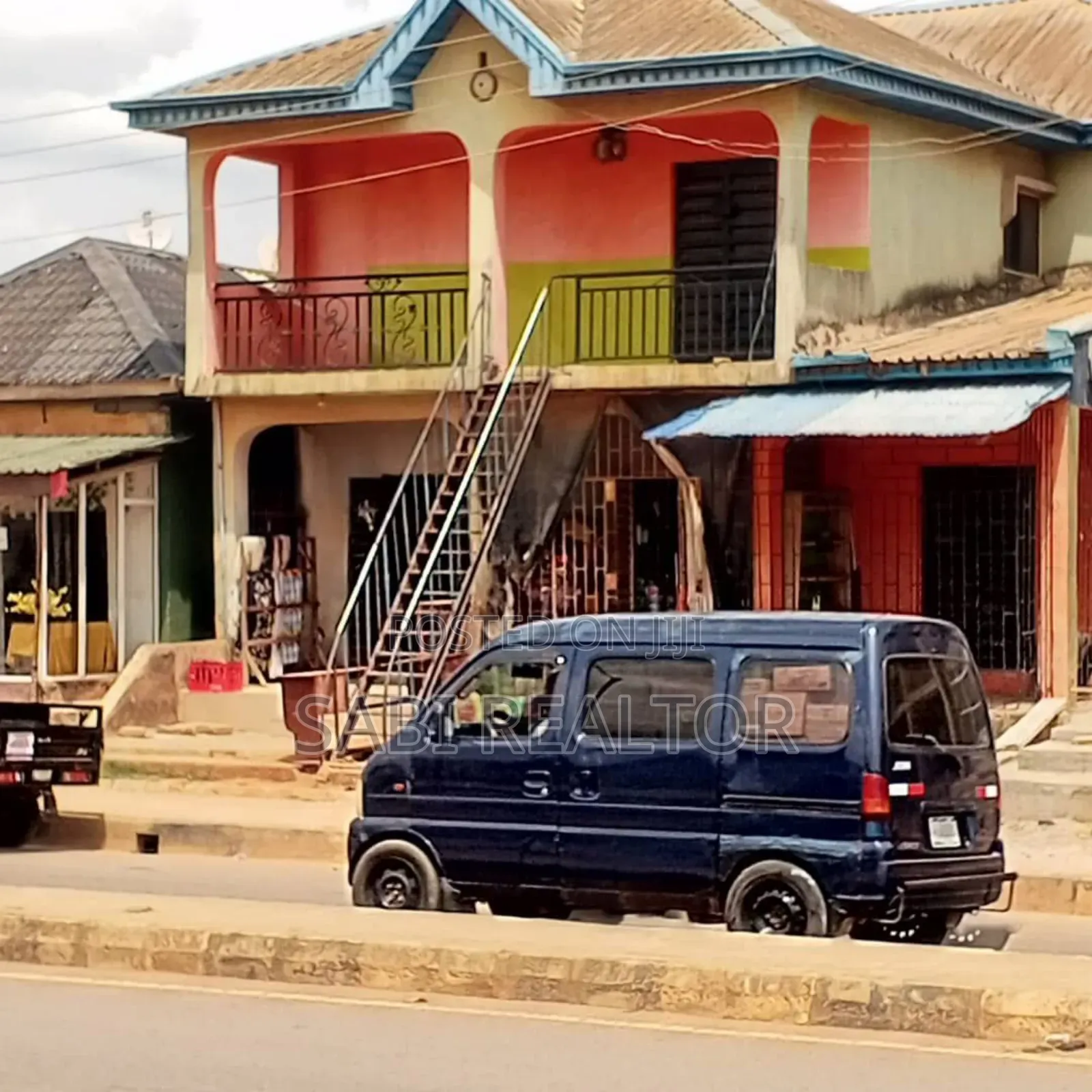 60x58ft With 3shops 2 Mini Flat Facing Ishefun Main Road Ayobo, Lagos