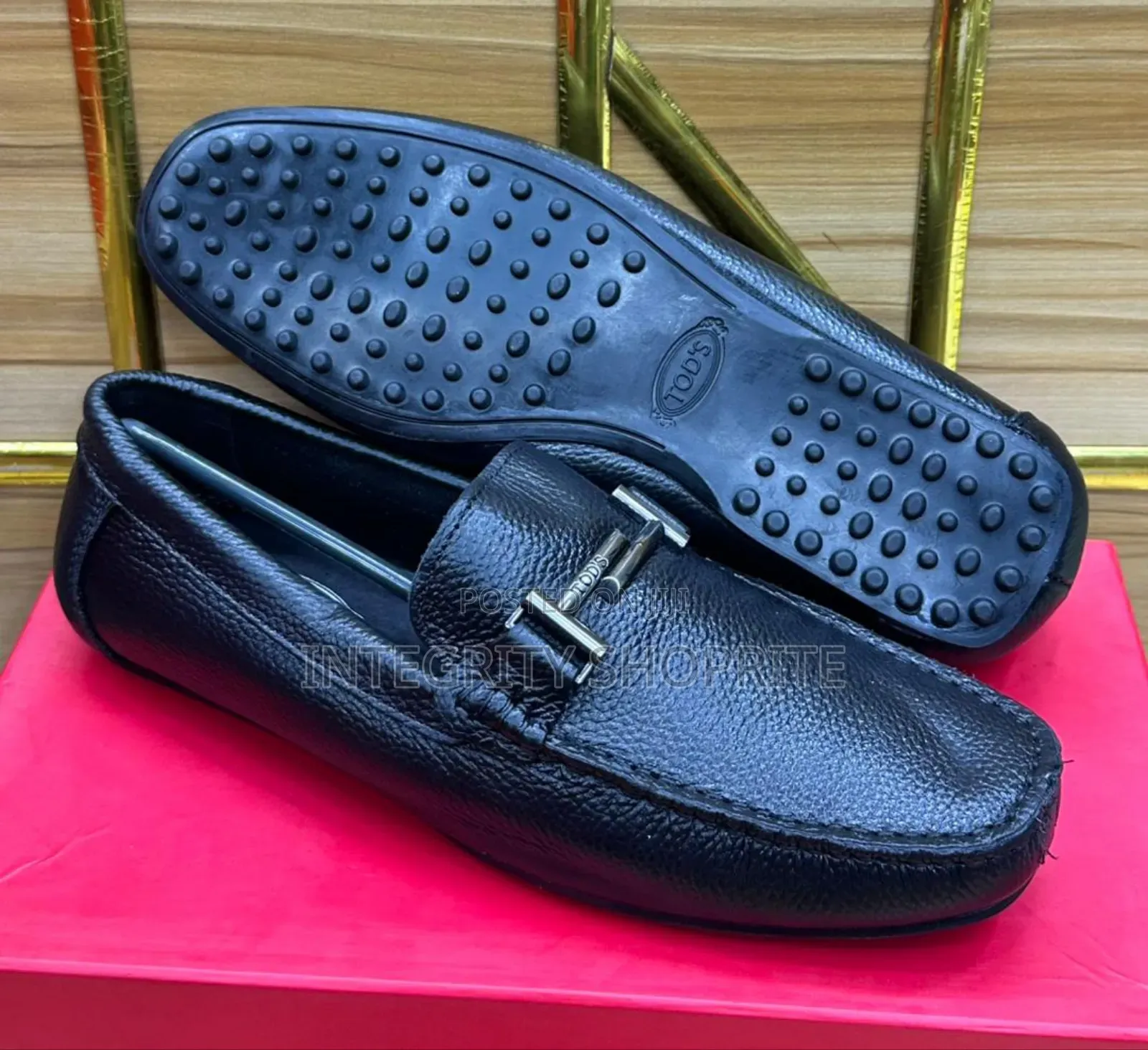 Tod's Black Leather Loafers