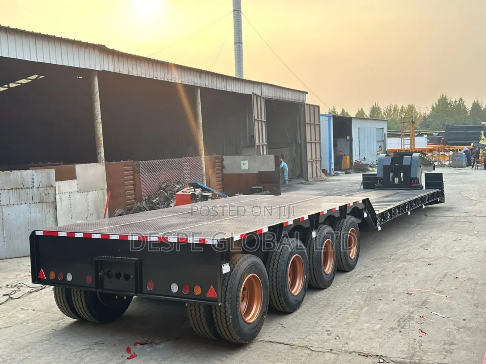 New 100tons Front Loader Lowbed Trailer With Discoupling Machine.