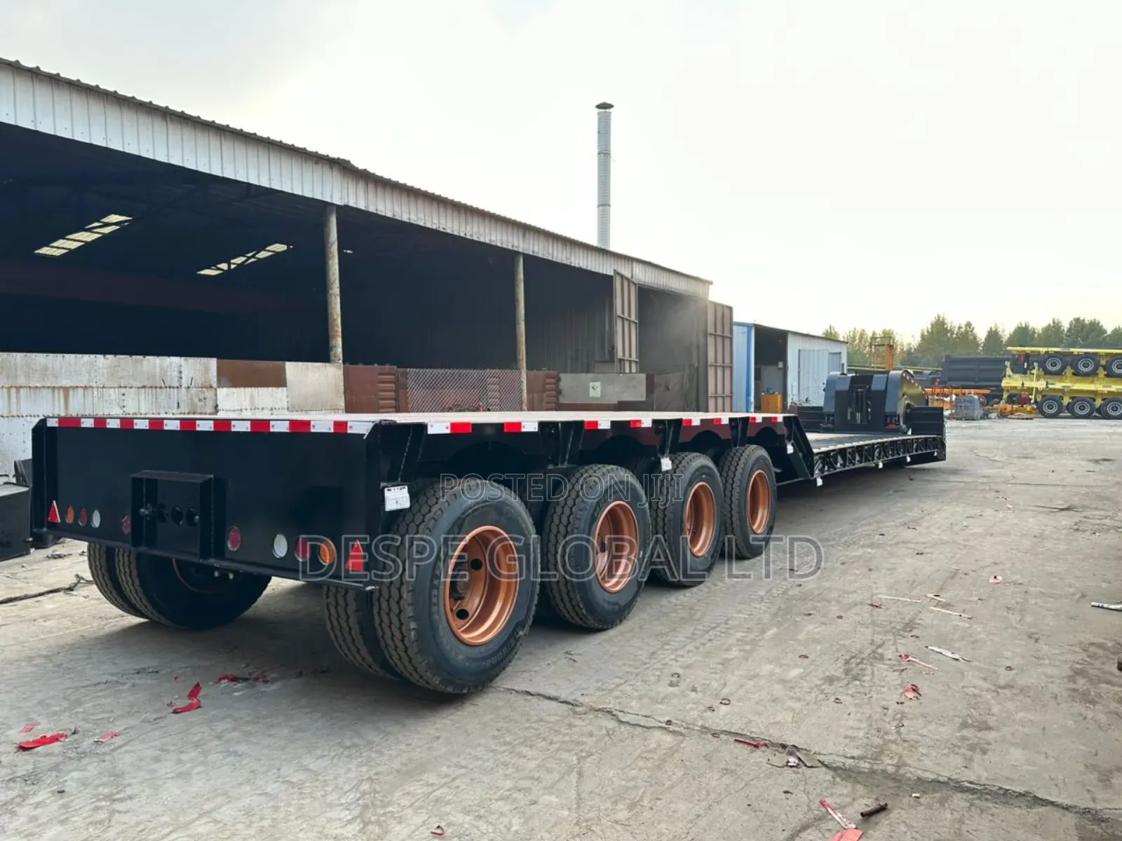 New 100tons Front Loader Lowbed Trailer With Discoupling Machine.