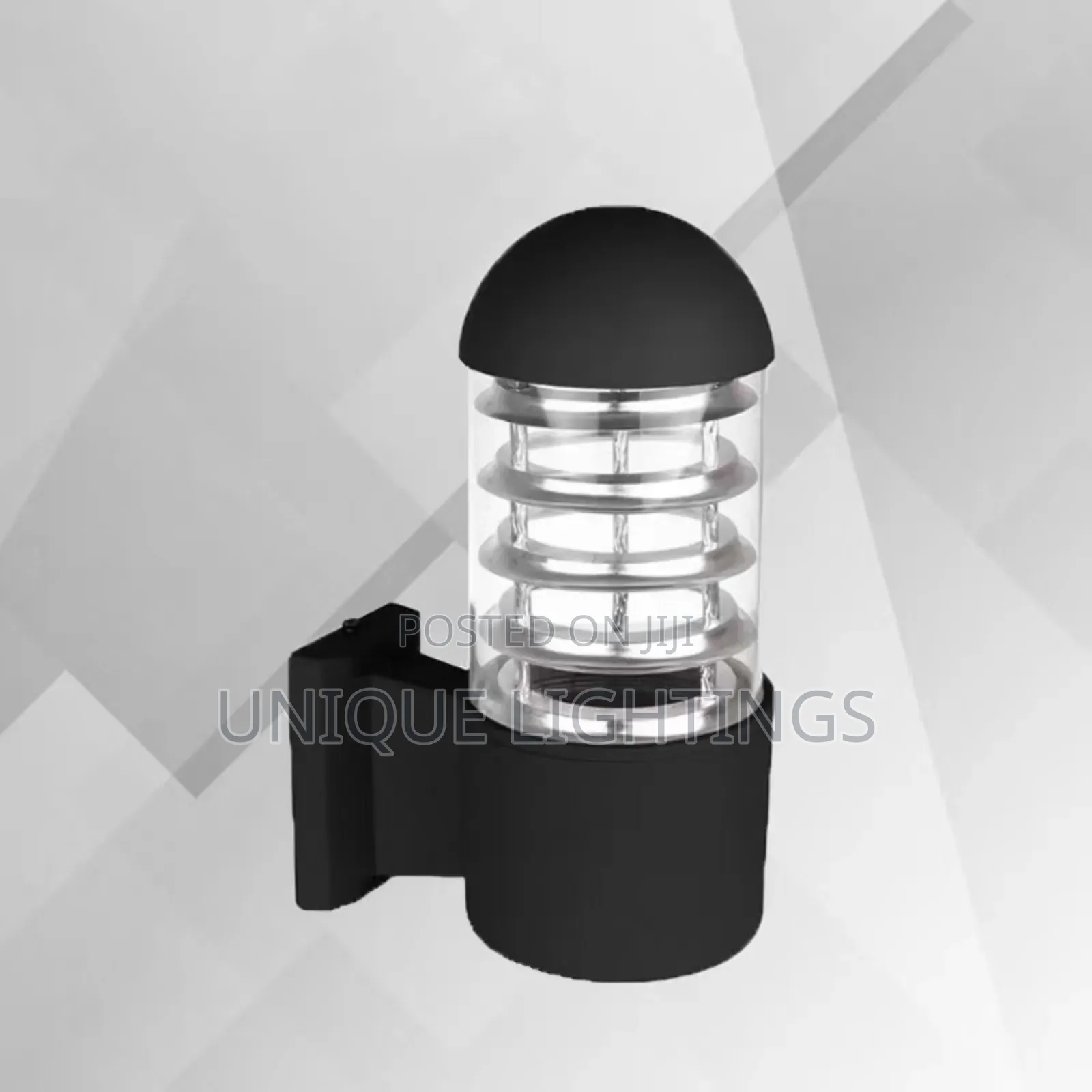 Outdoor Wall Light. Made of Pure Cast and Glass