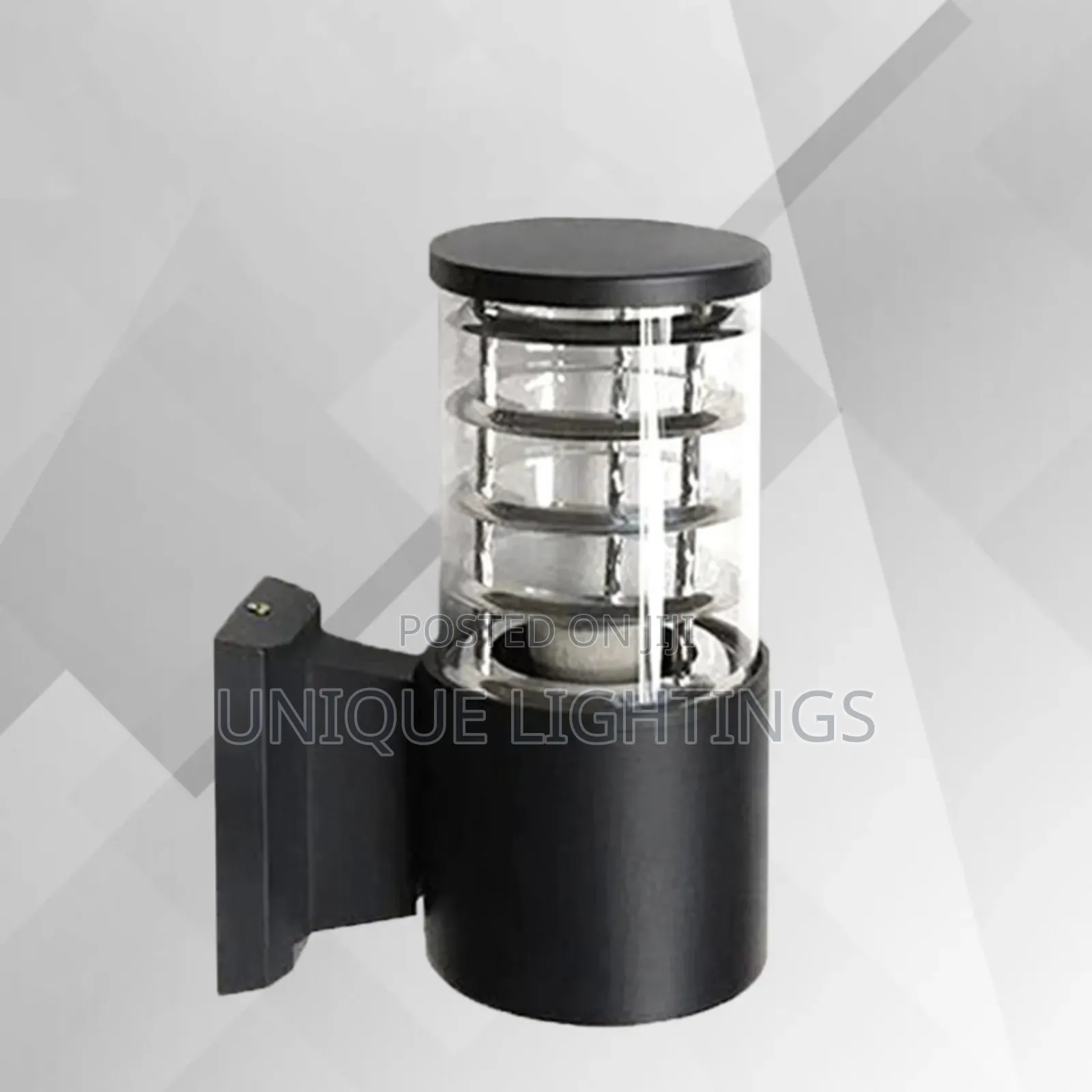 Outdoor Wall Light. Made of Pure Cast and Glass