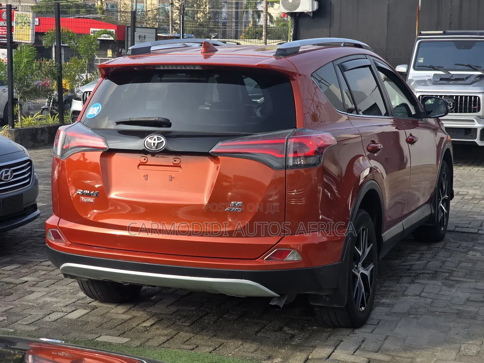 Toyota RAV4 SE AWD (2.5L 4cyl 6A) 2016 Orange