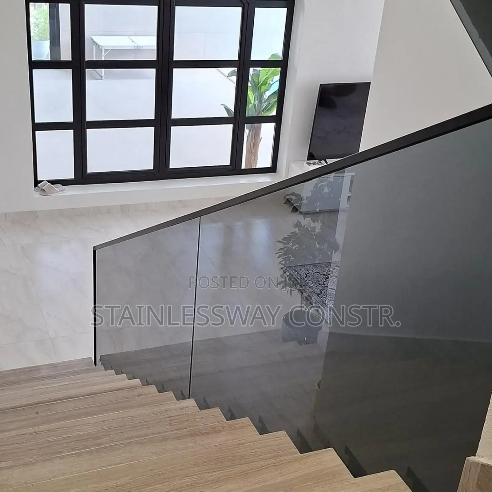 Sleek Sophisticated: Dark Grey Glass Railings
