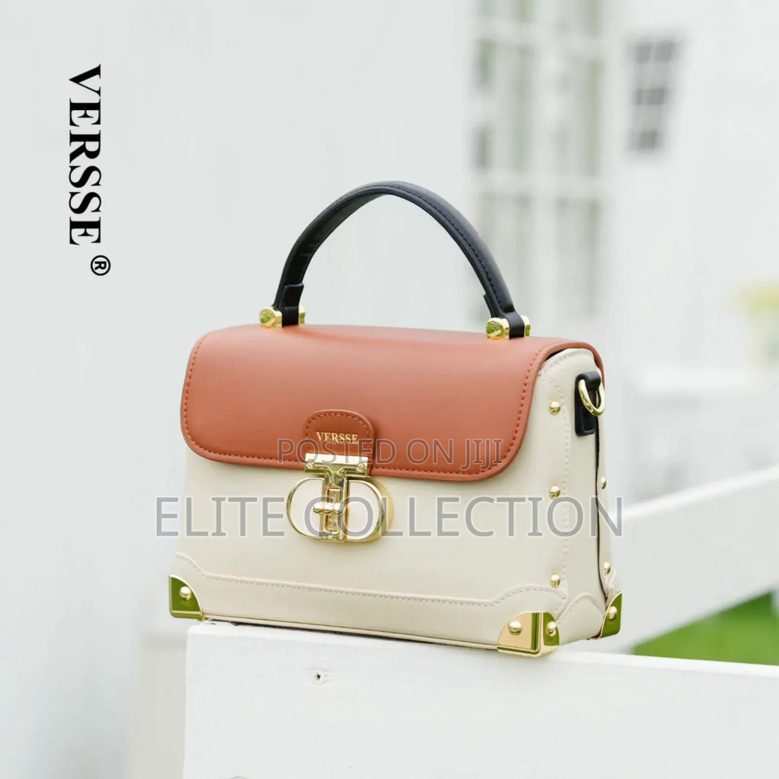 New in Versse Trunk Handle Bag* Size: Midi Colours: Muliticolors