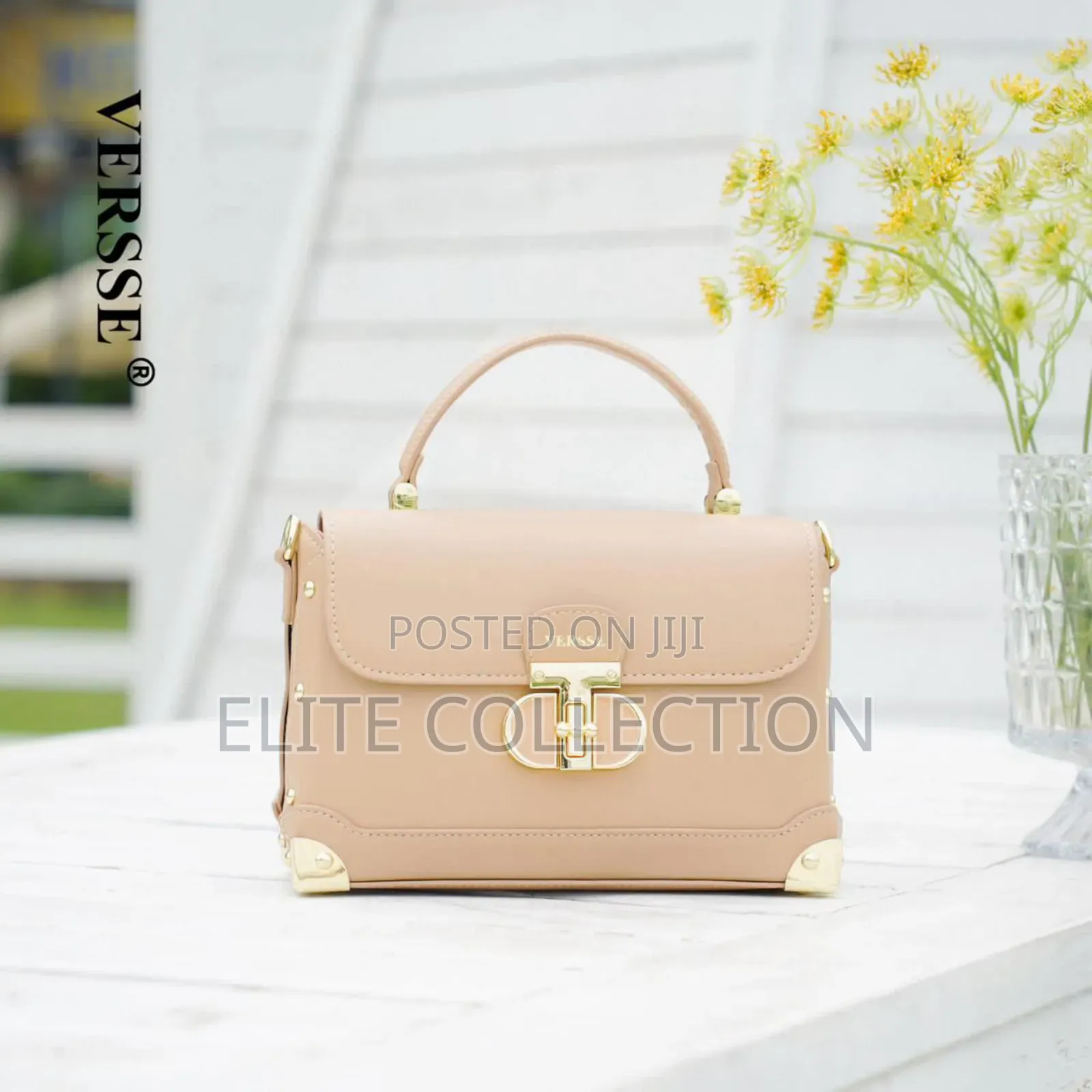 New in Versse Trunk Handle Bag* Size: Midi Colours: Muliticolors