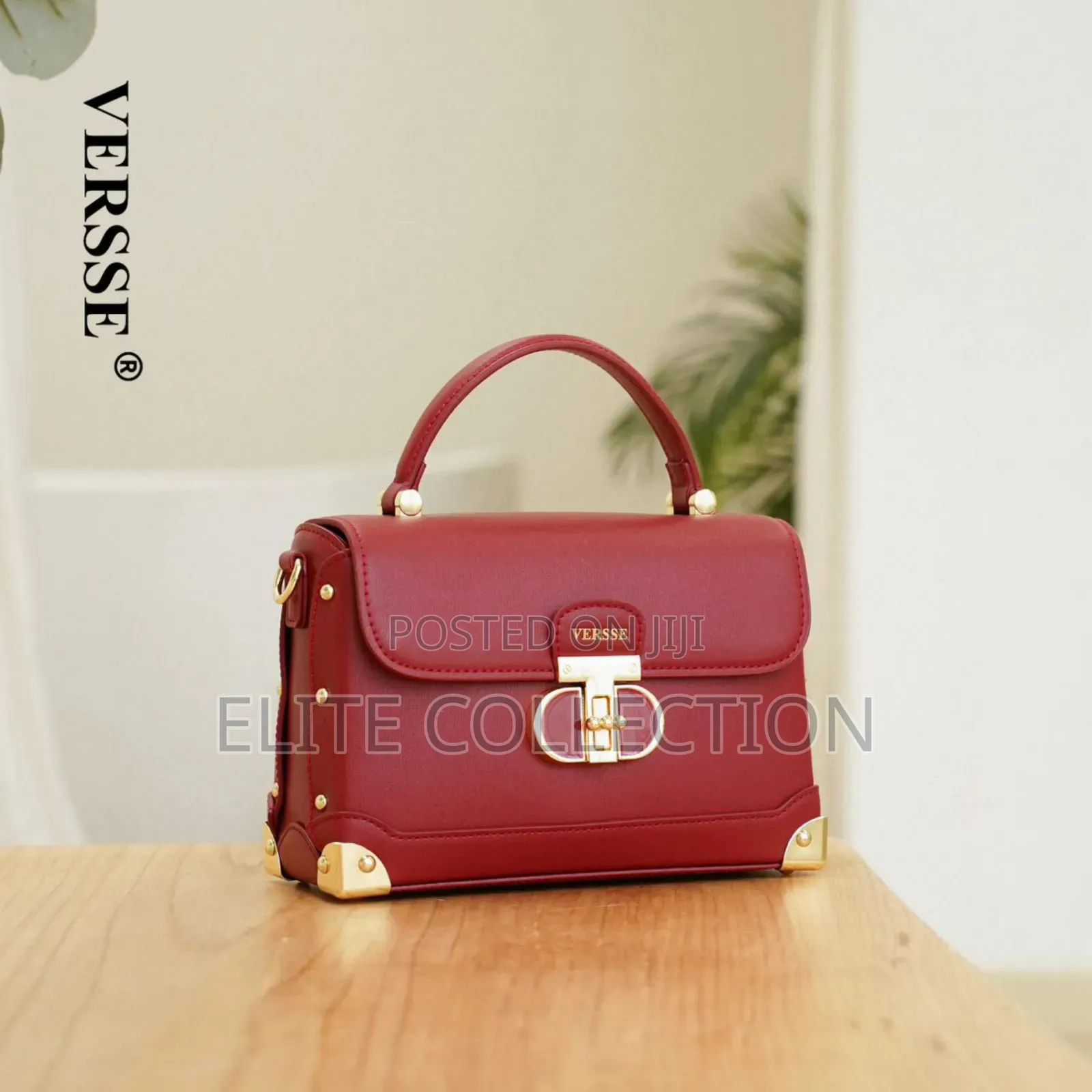 New in Versse Trunk Handle Bag* Size: Midi Colours: Muliticolors