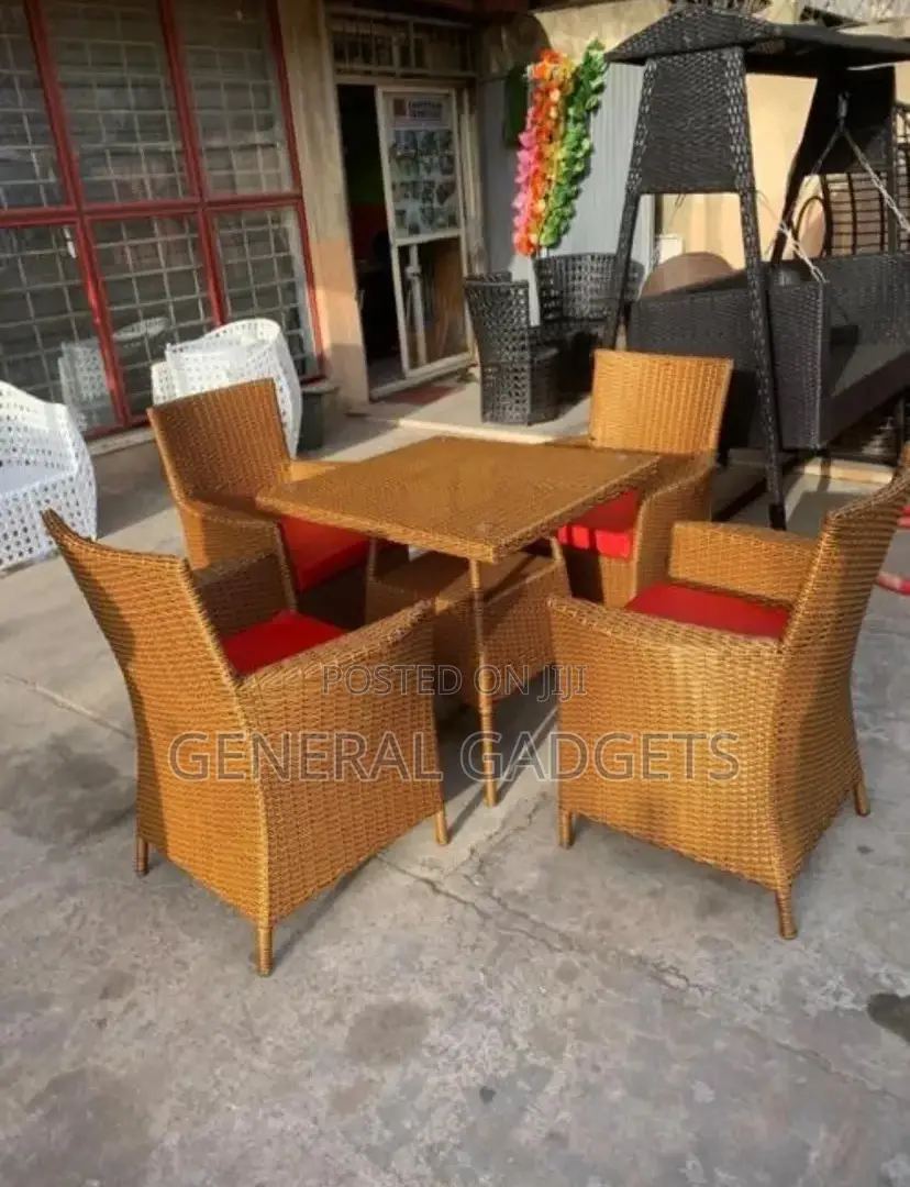 Rattan Table With Four Padded Chairs