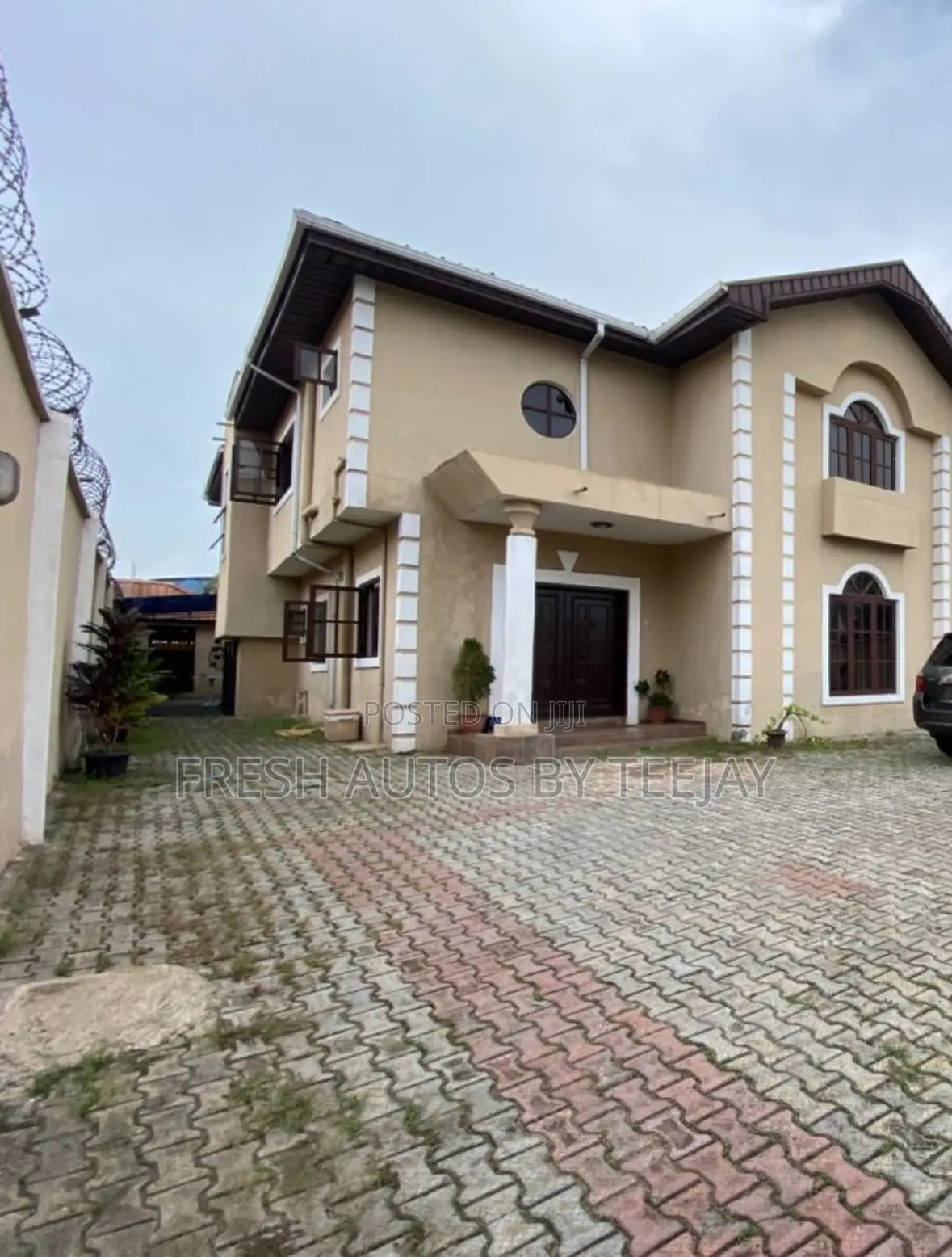 A Gated Table Land With Old Structure in Omole Phase2 Estate